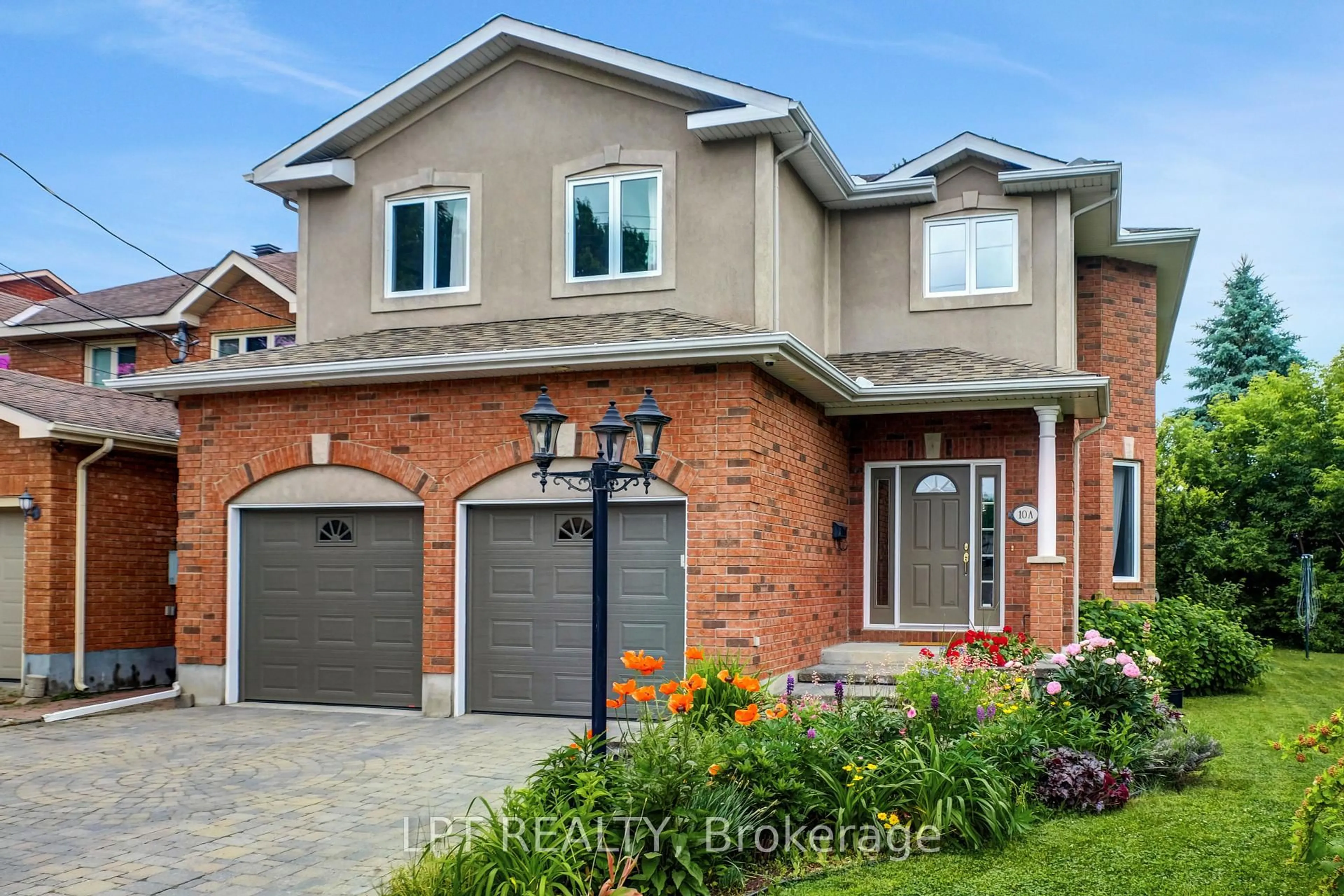 Home with brick exterior material, street for 10A Ashburn Dr, Ottawa Ontario K2E 6N3