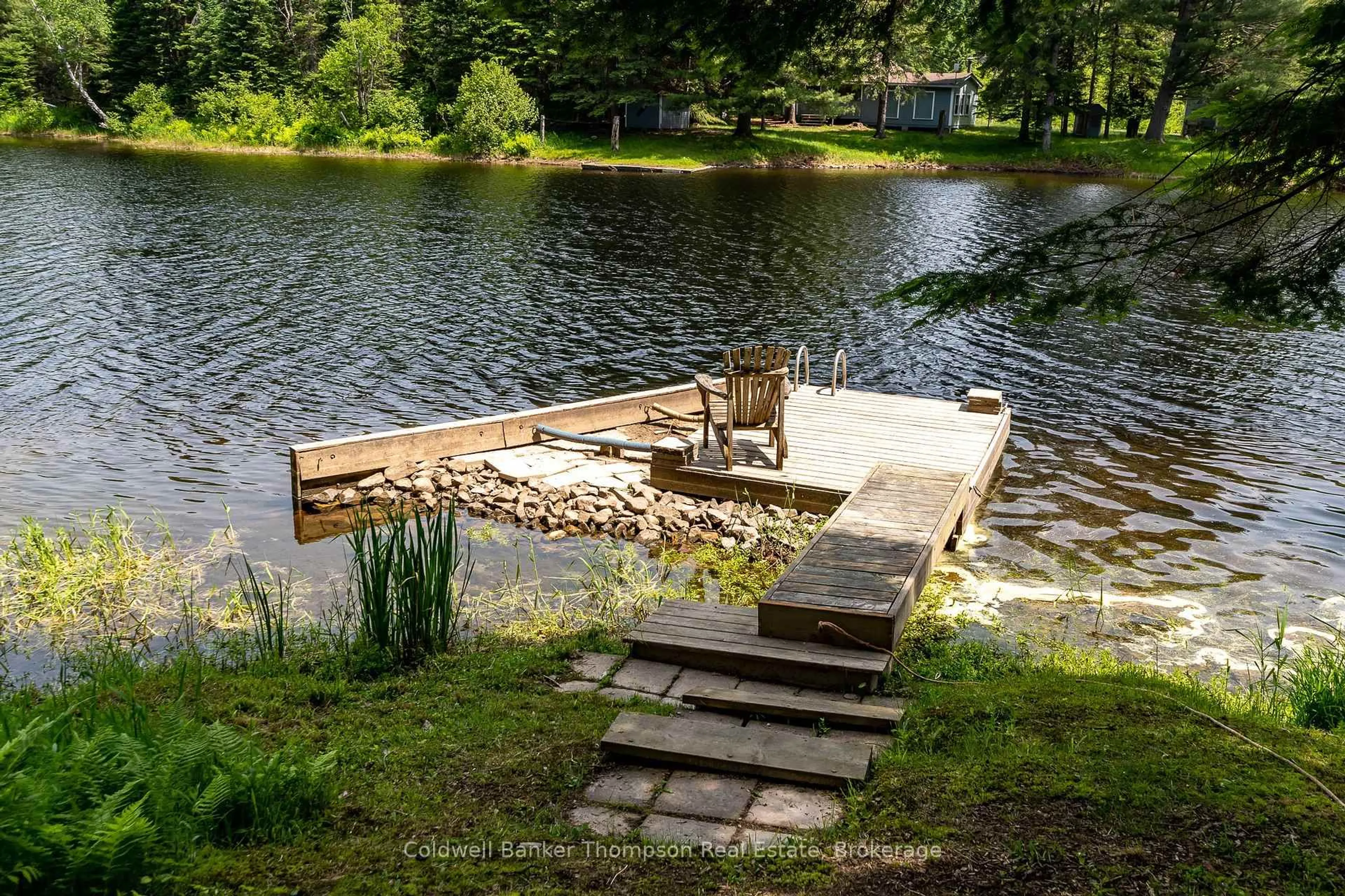 Patio, water/lake/river/ocean view for 57 Hiawatha Dr, Huntsville Ontario P0B 1L0