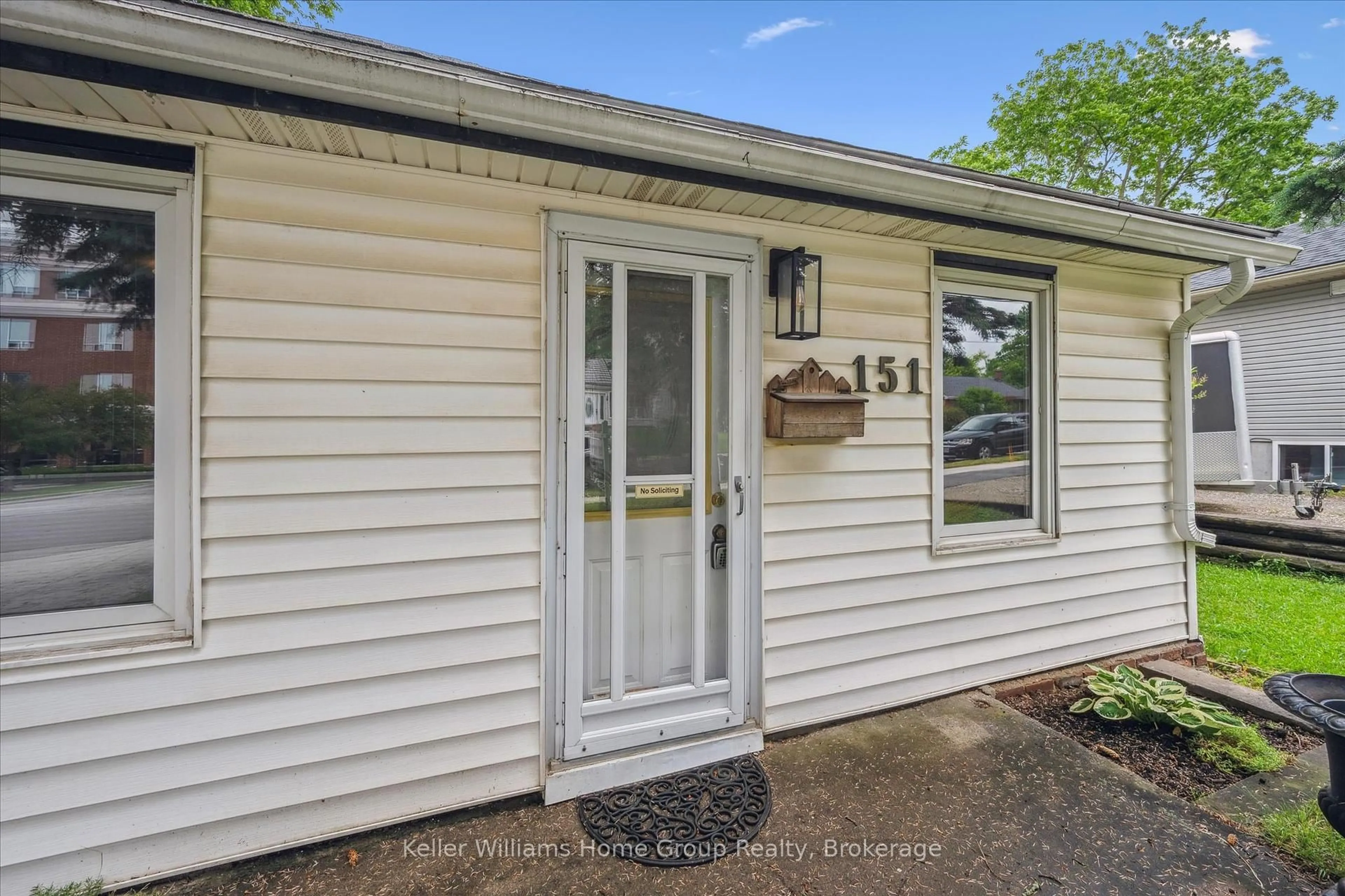 Home with vinyl exterior material, street for 151 Metcalfe St, Guelph Ontario N1E 4Y4