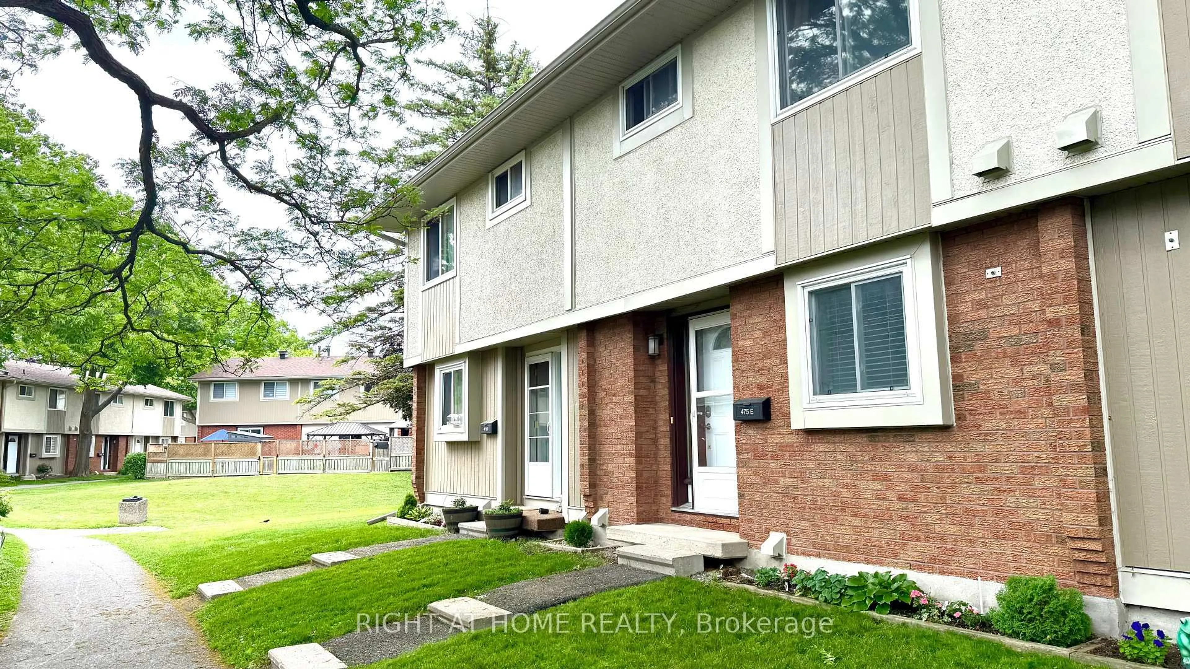 Home with brick exterior material, street for 475 MOODIE Dr #E, Ottawa Ontario K2H 8T7
