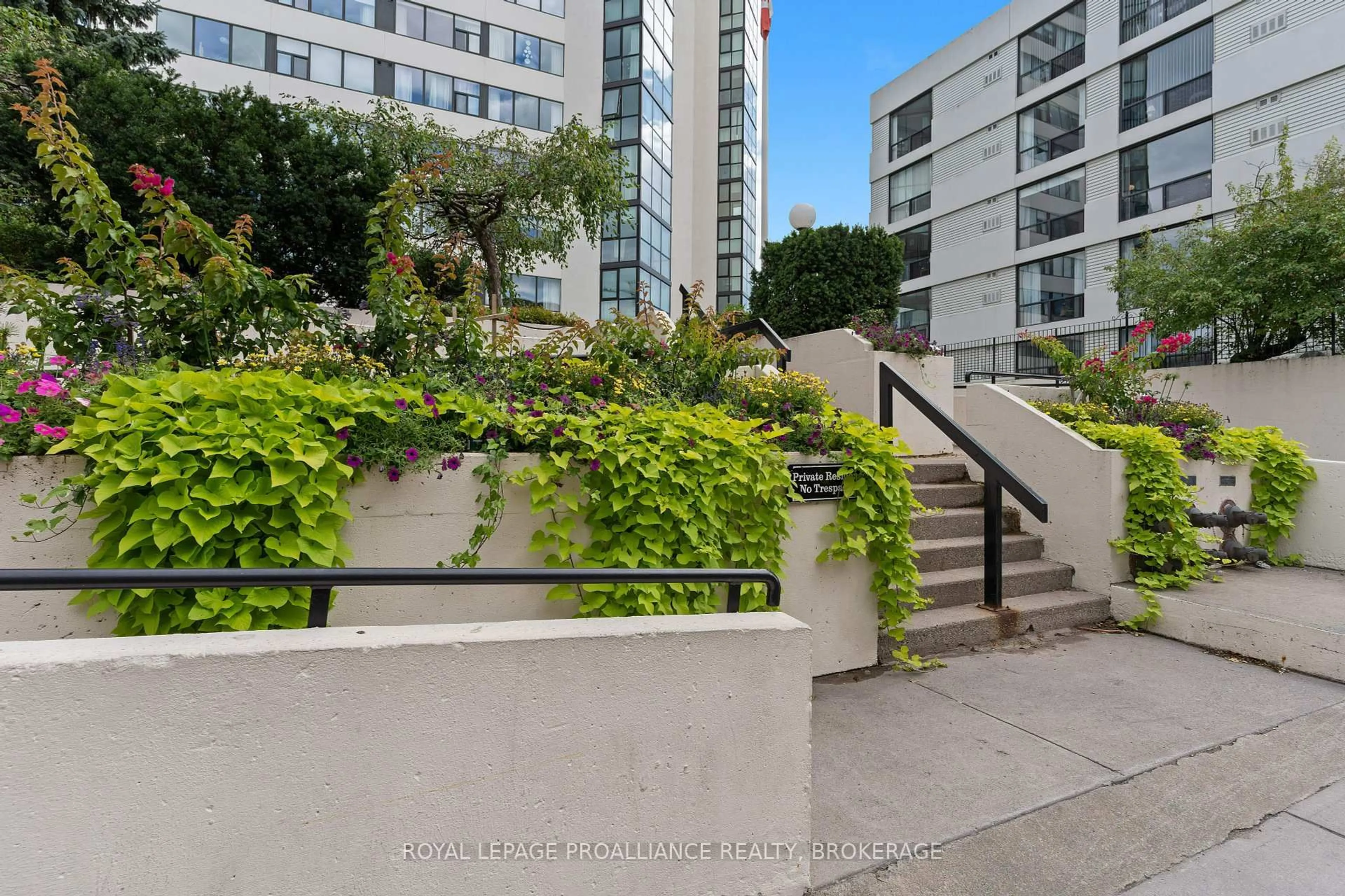Patio, city buildings view from balcony for 185 Ontario St #403, Kingston Ontario K7L 2Y7