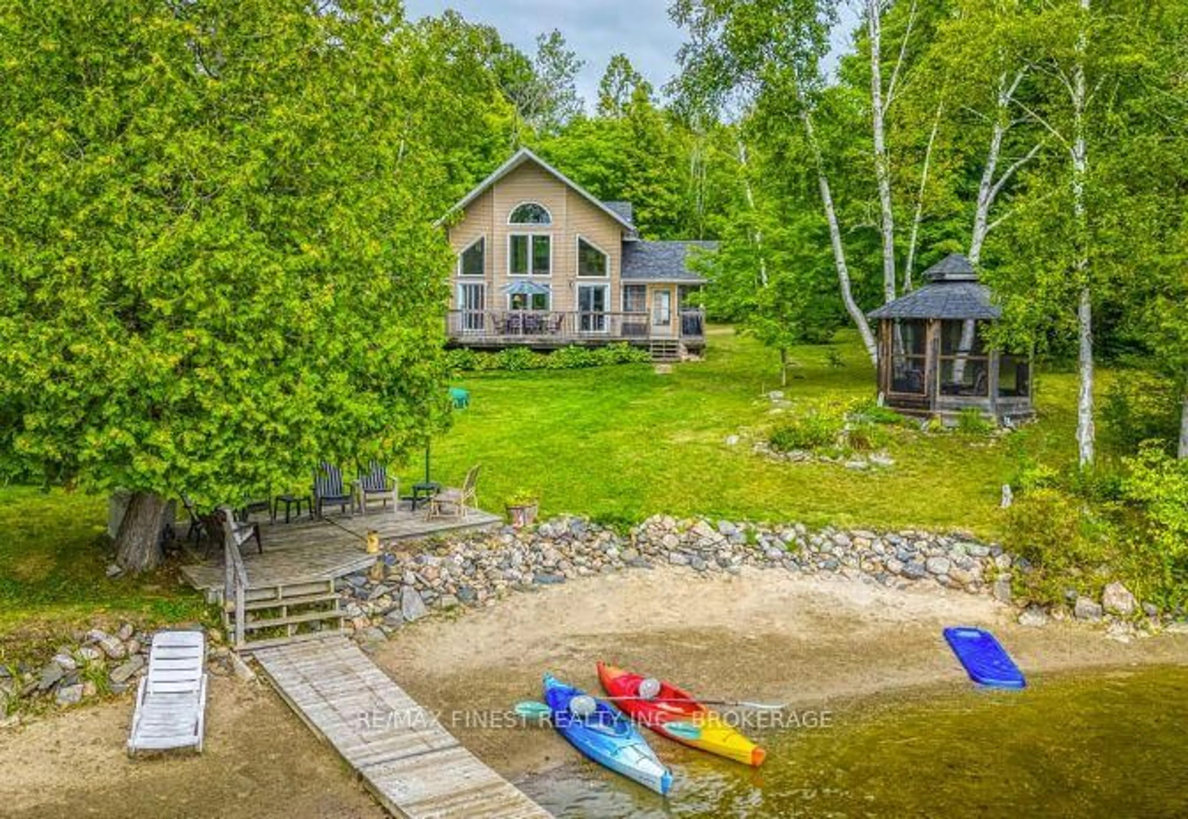 A pic from outside/outdoor area/front of a property/back of a property/a pic from drone, water/lake/river/ocean view for 1602 Baker Valley Rd, Arden Ontario K0H 1B0