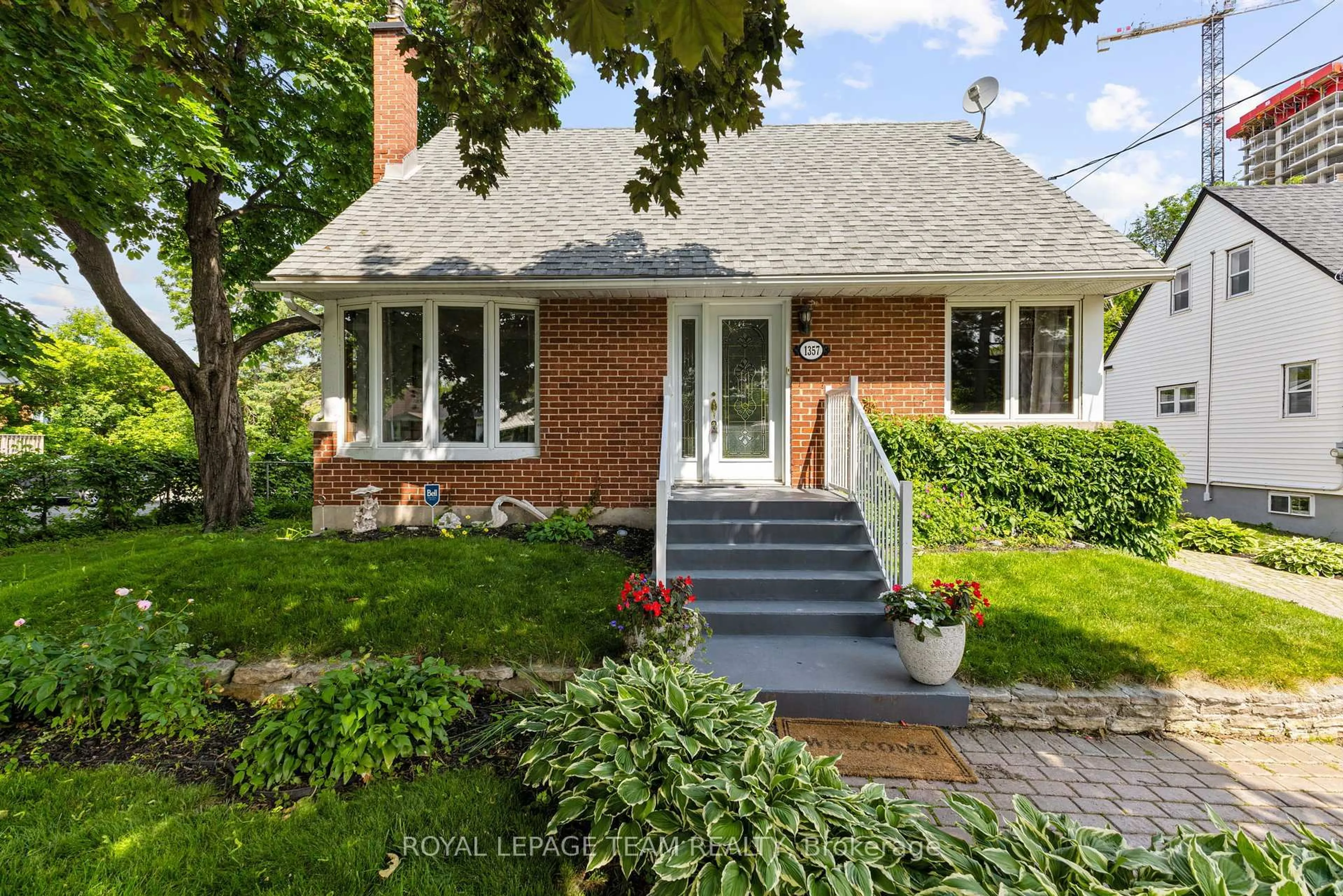 Home with brick exterior material, street for 1357 Thames St, Ottawa Ontario K1Z 7N3