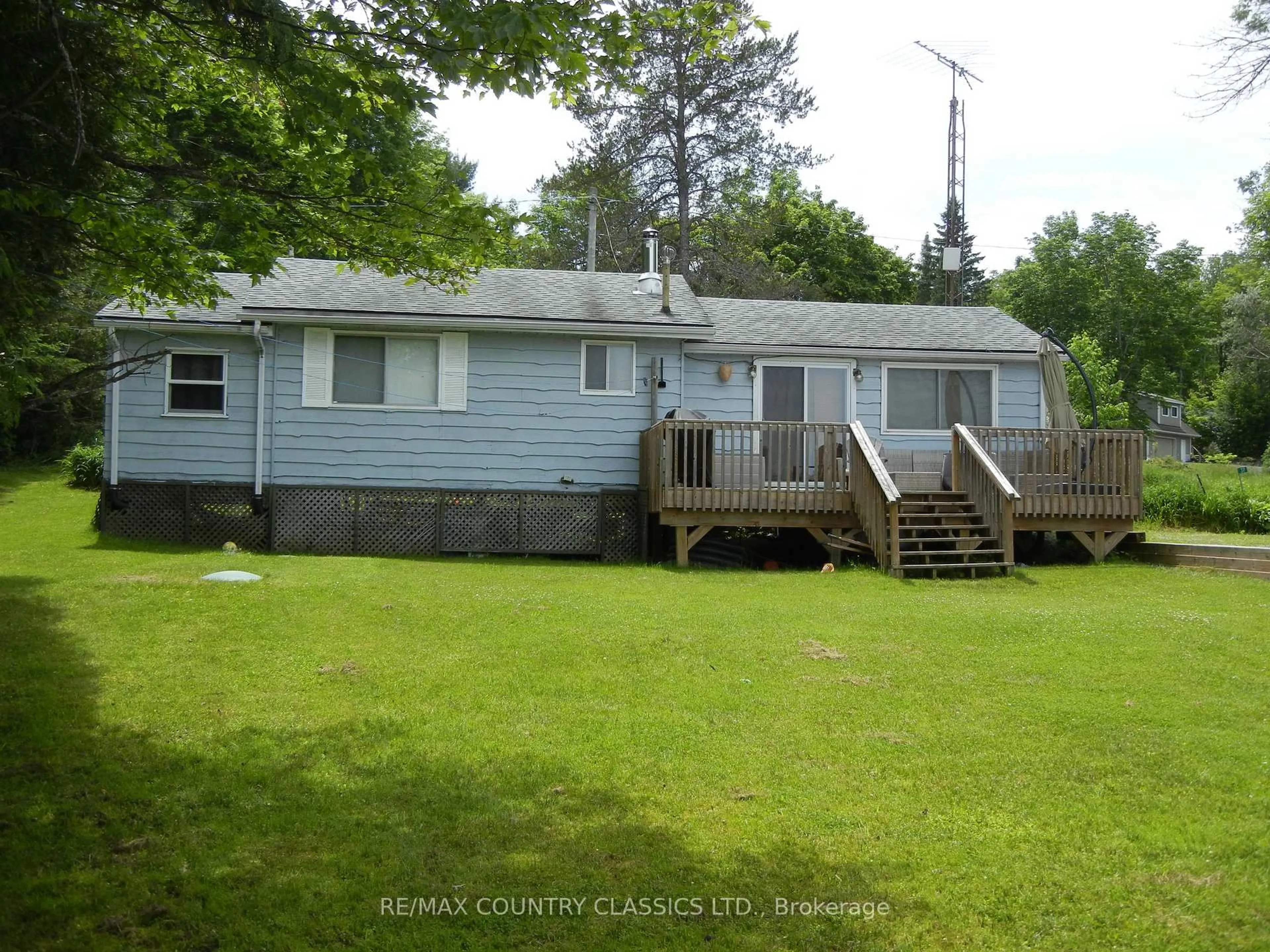 A pic from outside/outdoor area/front of a property/back of a property/a pic from drone, water/lake/river/ocean view for 37 Goldfinch Lane, North Kawartha Ontario K0L 1A0