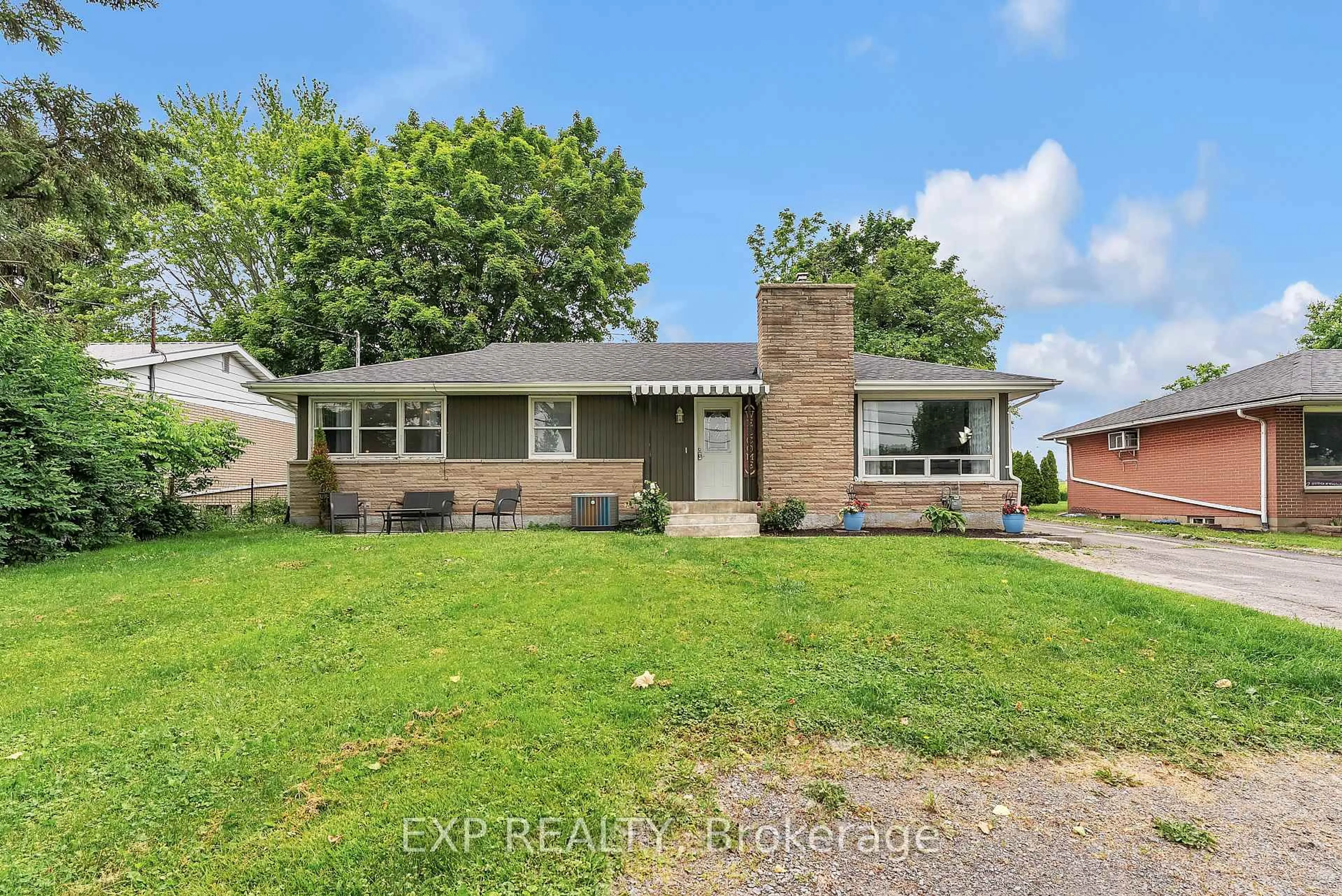 Home with brick exterior material, street for 13238 Loyalist Pkwy, Prince Edward County Ontario K0K 2T0