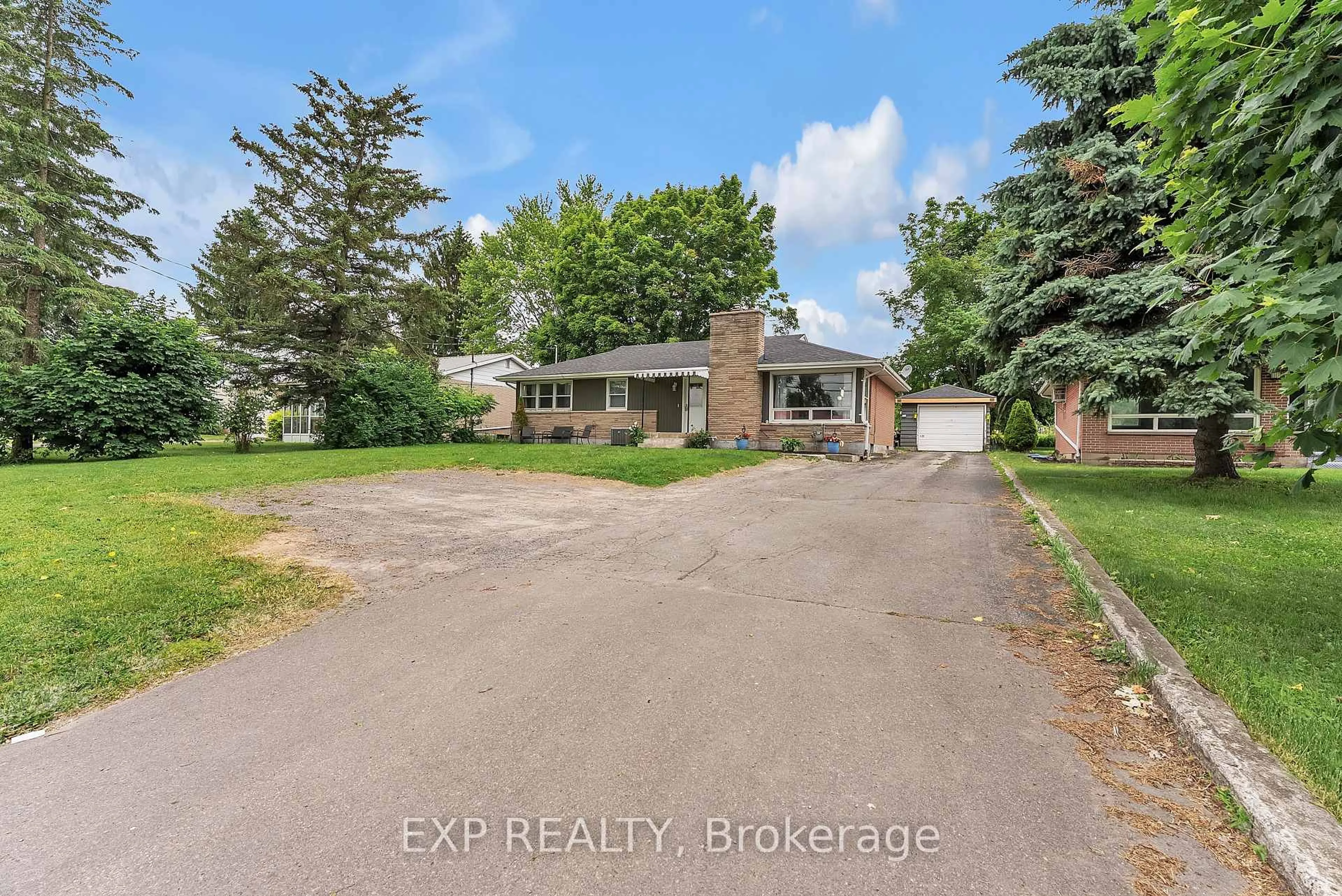 A pic from outside/outdoor area/front of a property/back of a property/a pic from drone, street for 13238 Loyalist Pkwy, Prince Edward County Ontario K0K 2T0