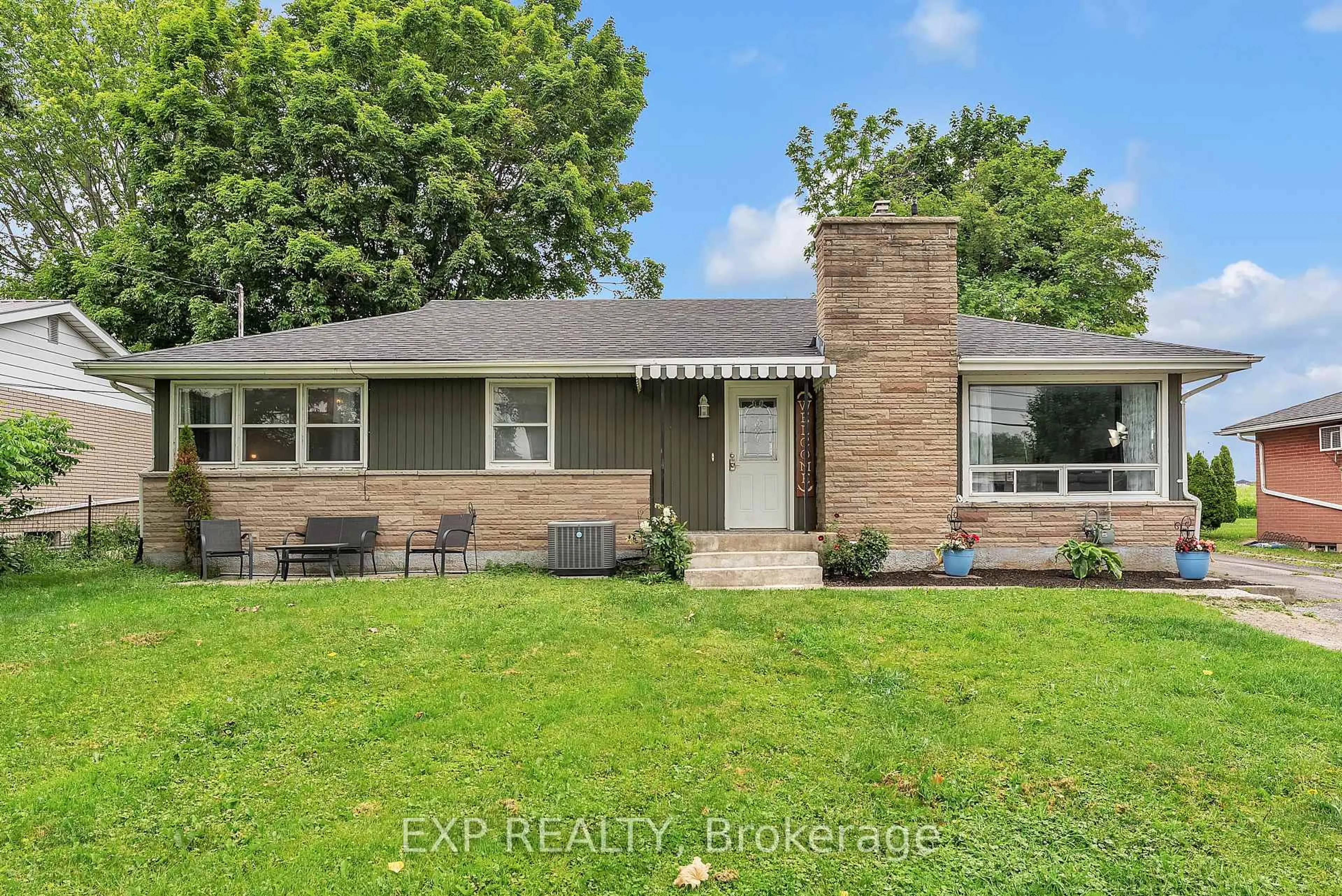 Home with brick exterior material, street for 13238 Loyalist Pkwy, Prince Edward County Ontario K0K 2T0