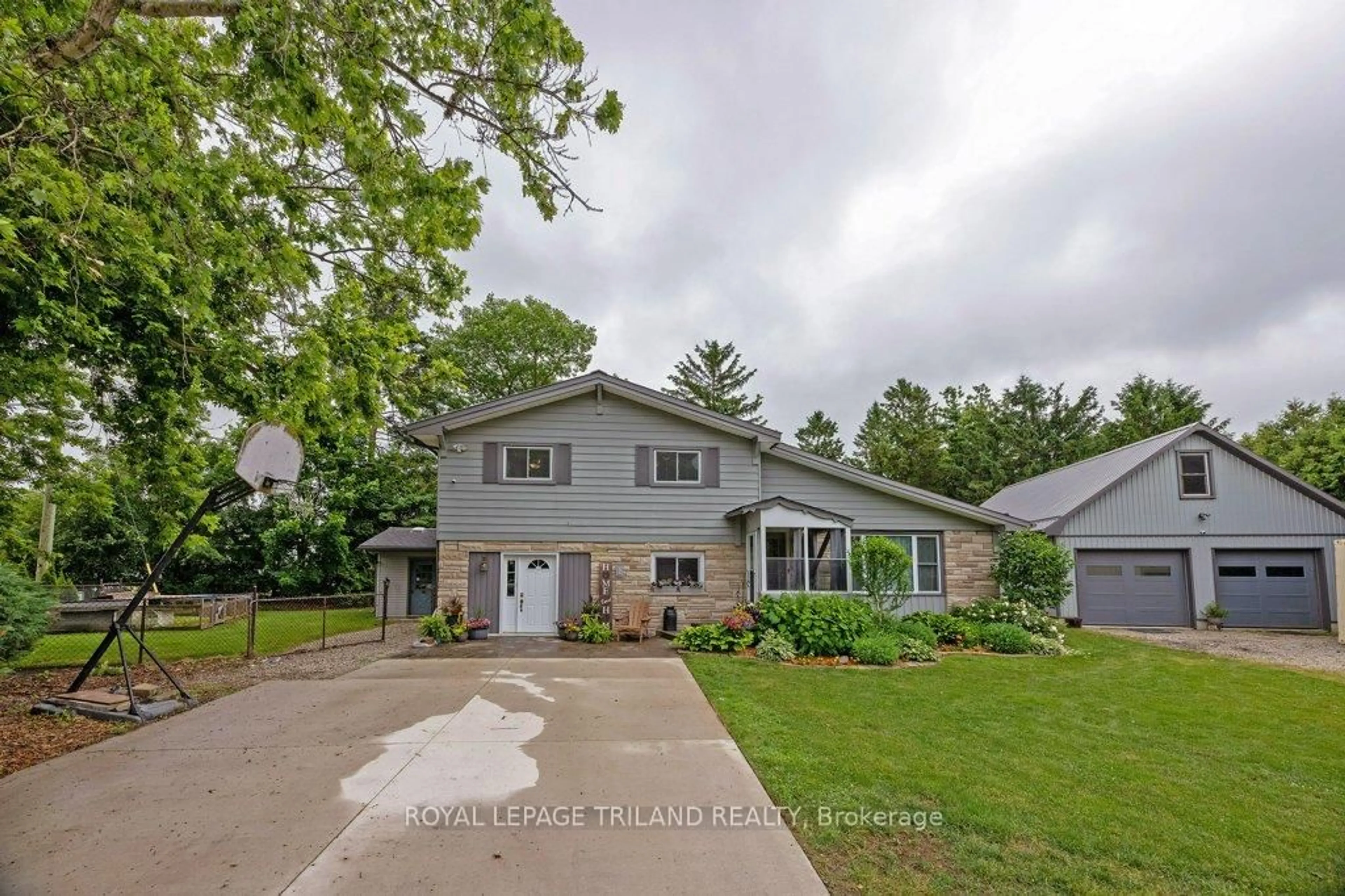 A pic from outside/outdoor area/front of a property/back of a property/a pic from drone, street for 10025 LYN Crt, Southwold Ontario N5P 2E8