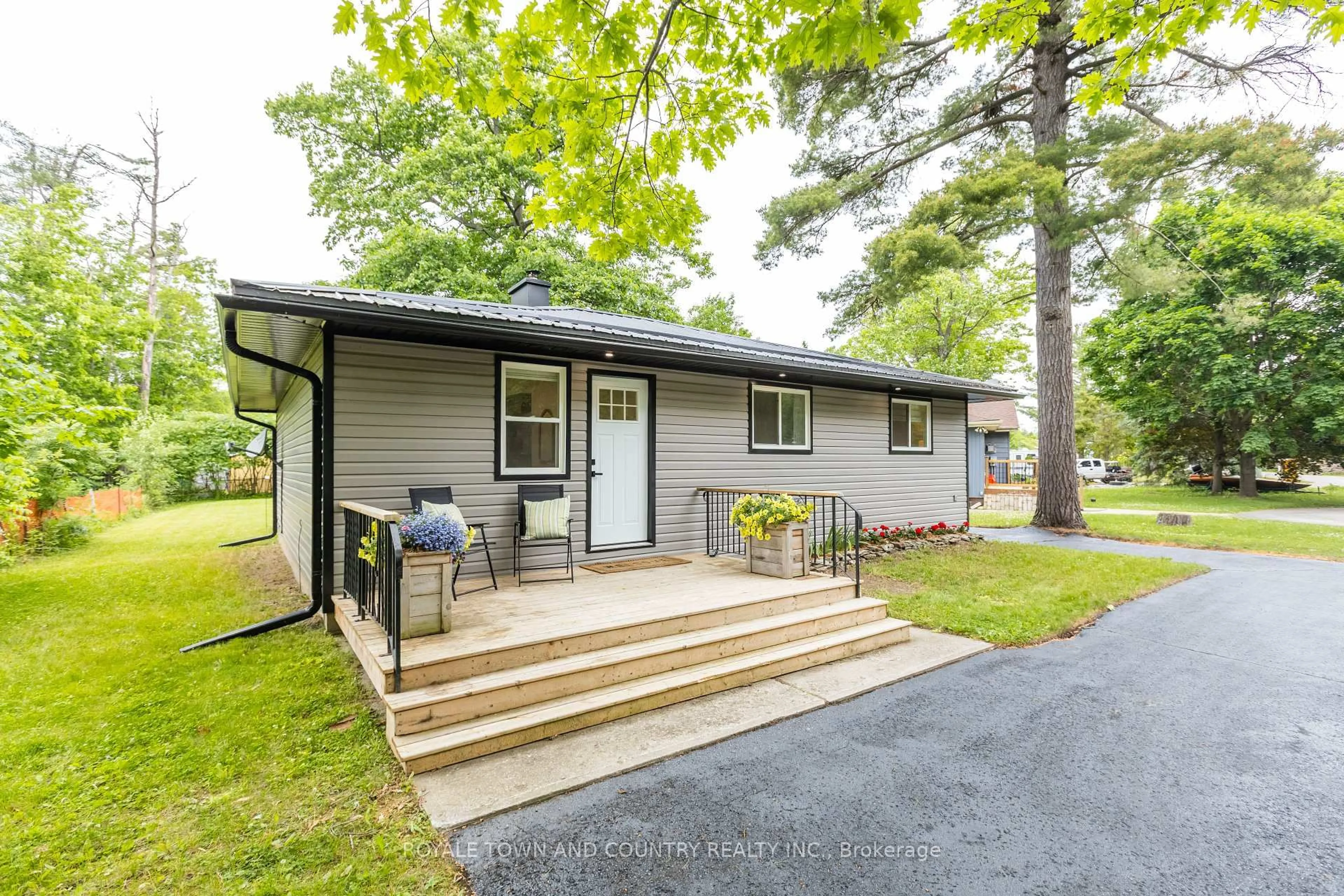 Home with vinyl exterior material, street for 9 Parkhill Dr, Kawartha Lakes Ontario K0M 1N0