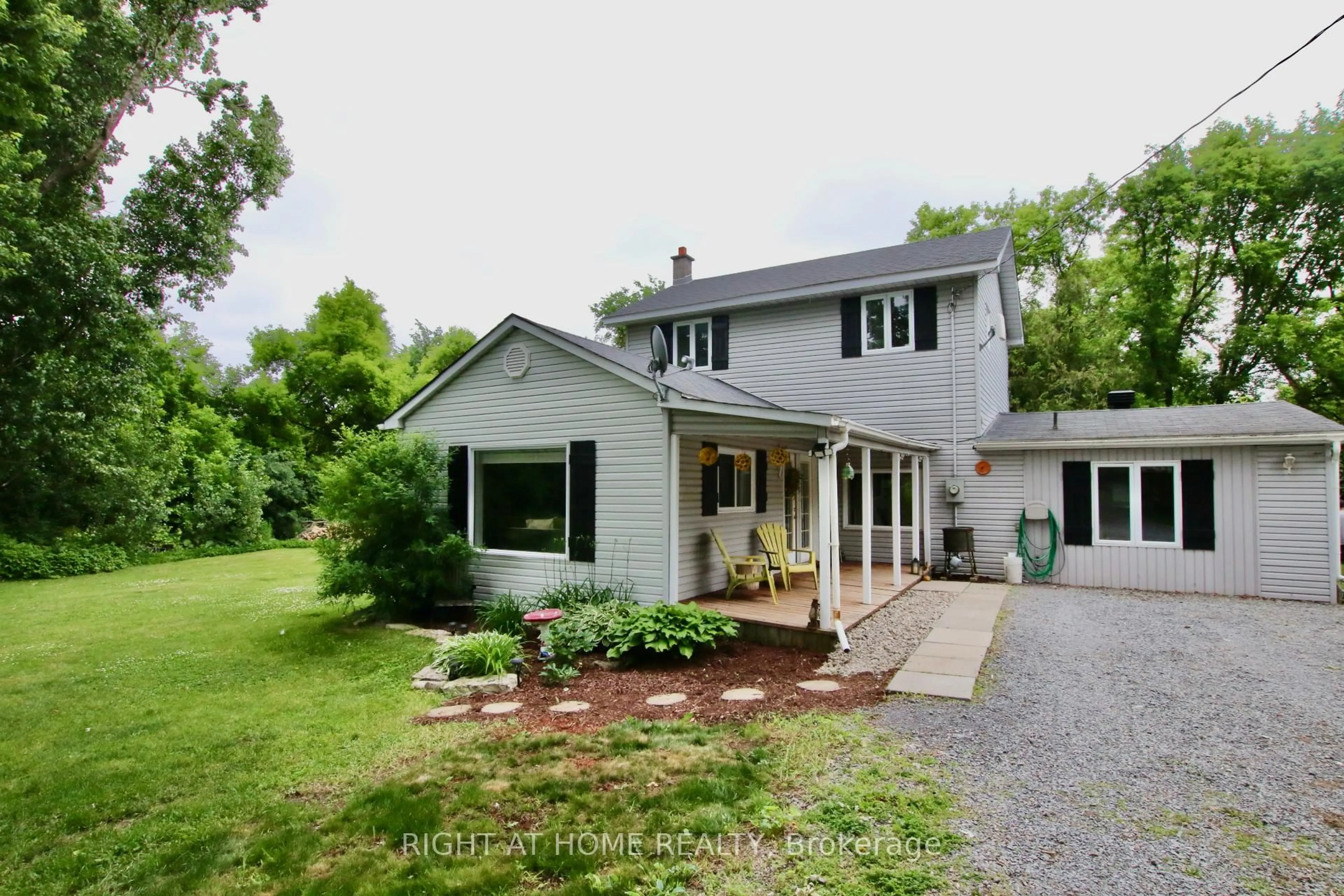 A pic from outside/outdoor area/front of a property/back of a property/a pic from drone, street for 13928 Connaught Rd, North Dundas Ontario K0C 1H0