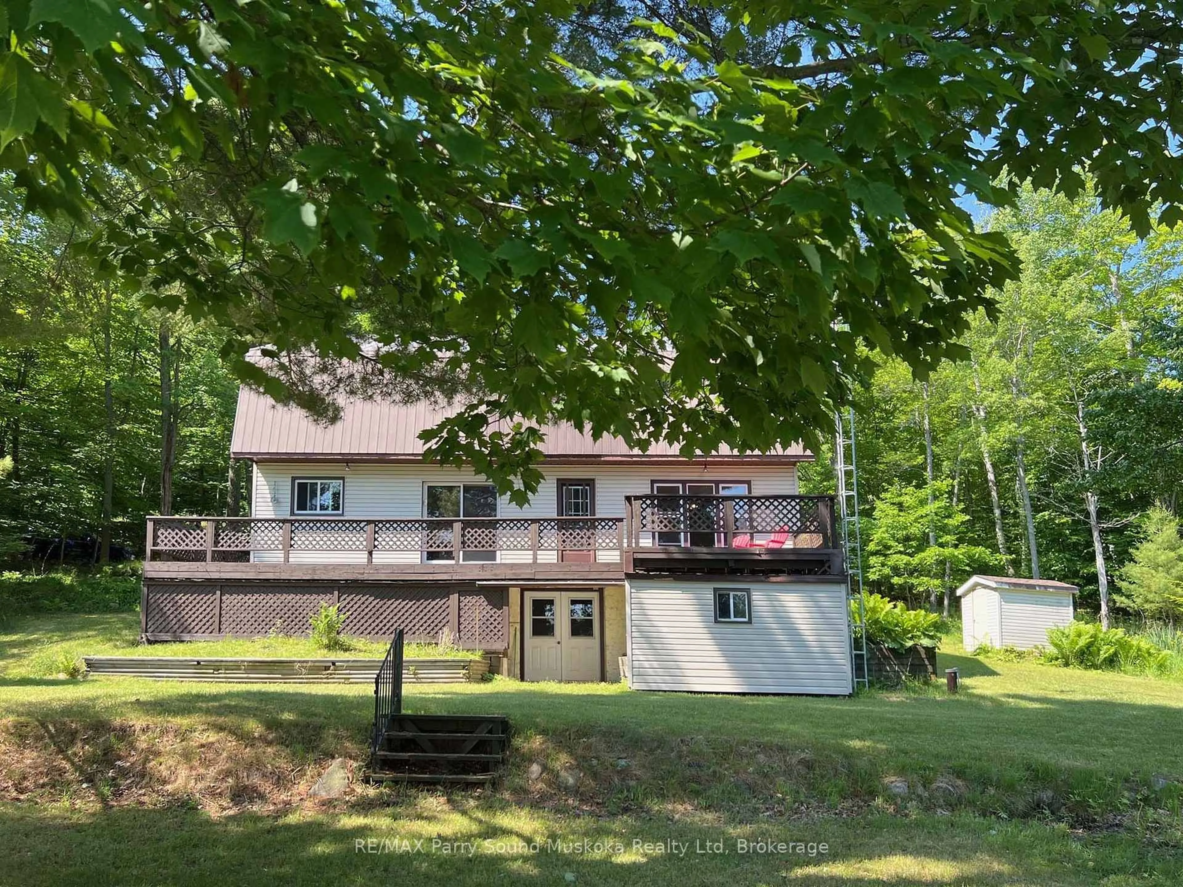 A pic from outside/outdoor area/front of a property/back of a property/a pic from drone, water/lake/river/ocean view for 10 Pine Valley Dr, Carling Ontario P0G 1G0