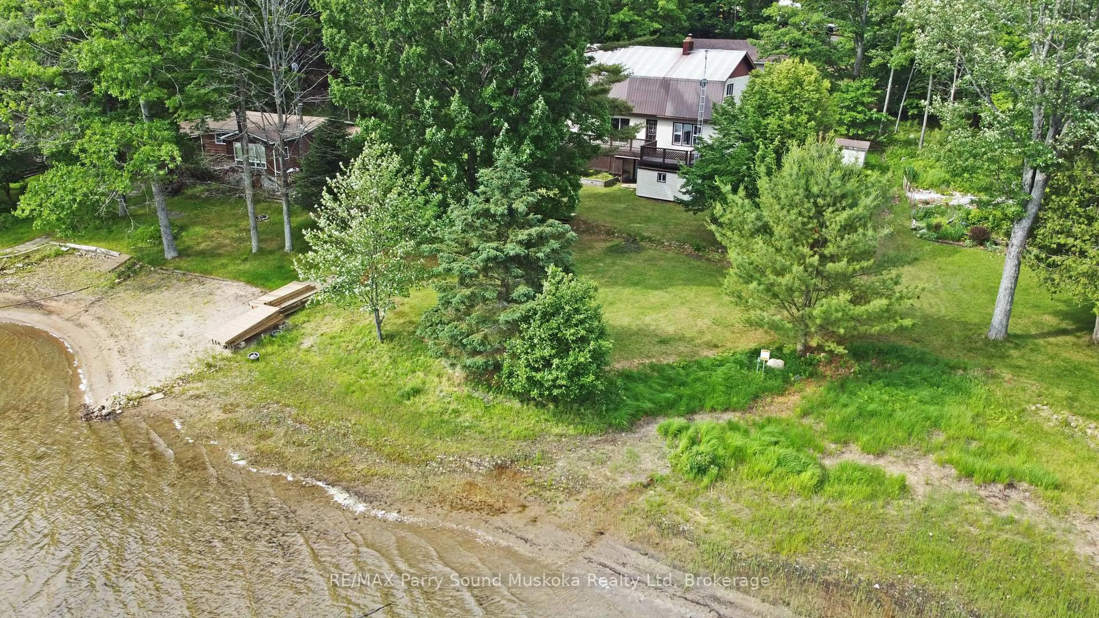 A pic from outside/outdoor area/front of a property/back of a property/a pic from drone, forest/trees view for 10 Pine Valley Dr, Carling Ontario P0G 1G0