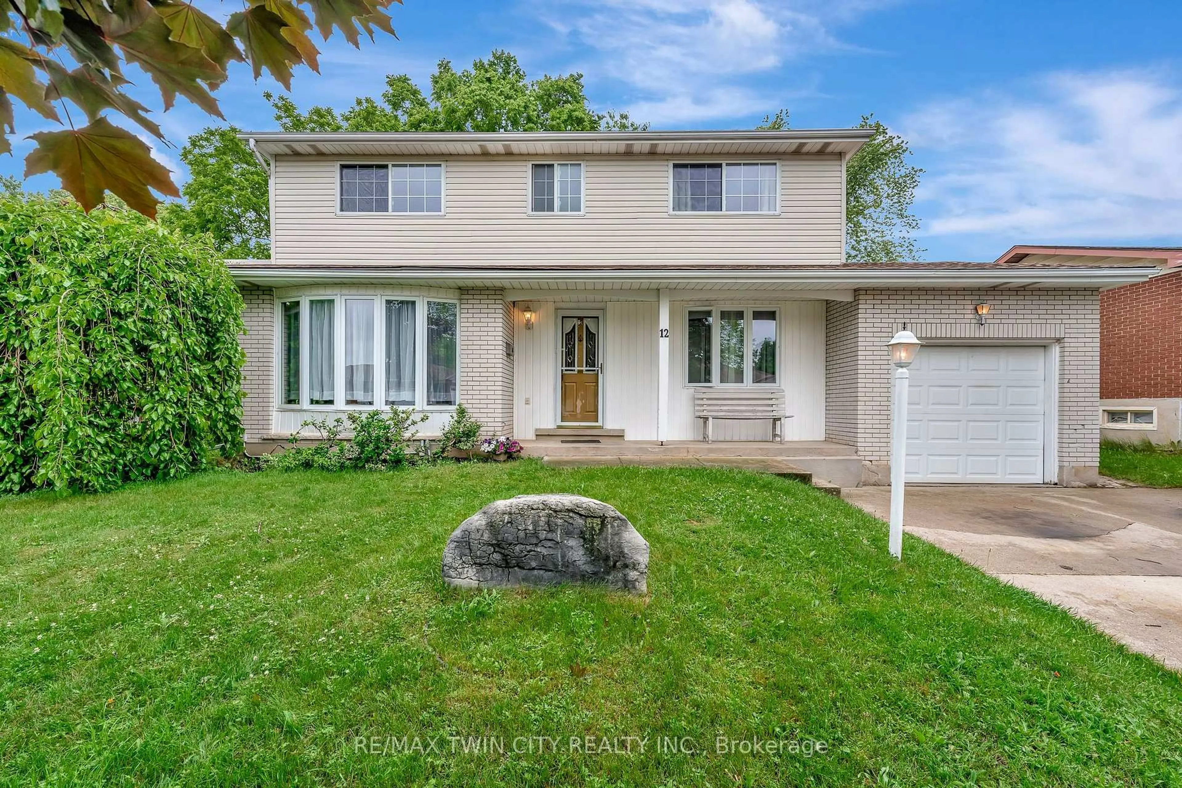 Home with vinyl exterior material, street for 12 Forestwood Dr, Kitchener Ontario N2N 1B1