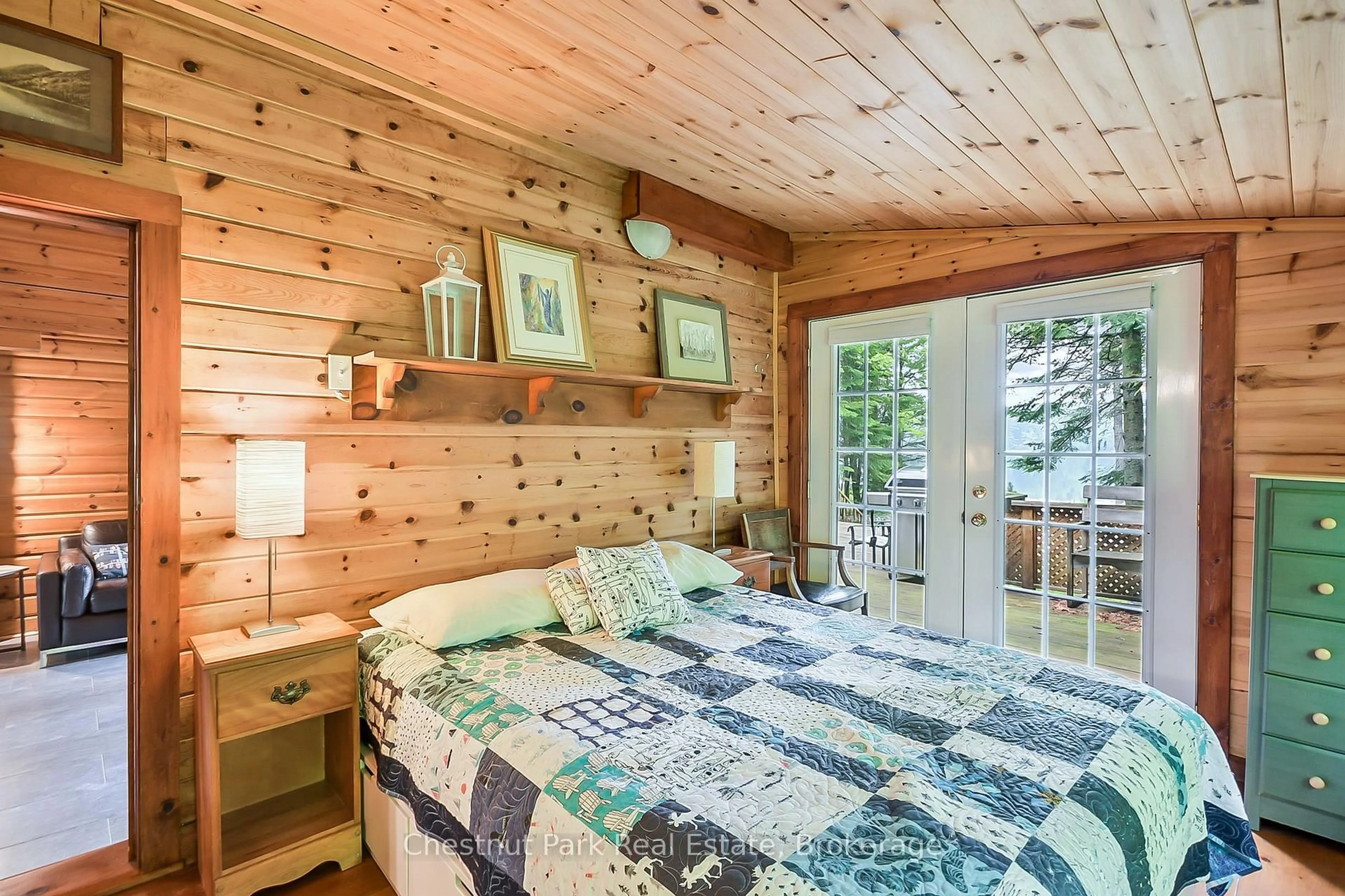 Bedroom with bed, wood/laminate floor for 1002 Leech Lake Point Rd, Bracebridge Ontario P1L 1X3