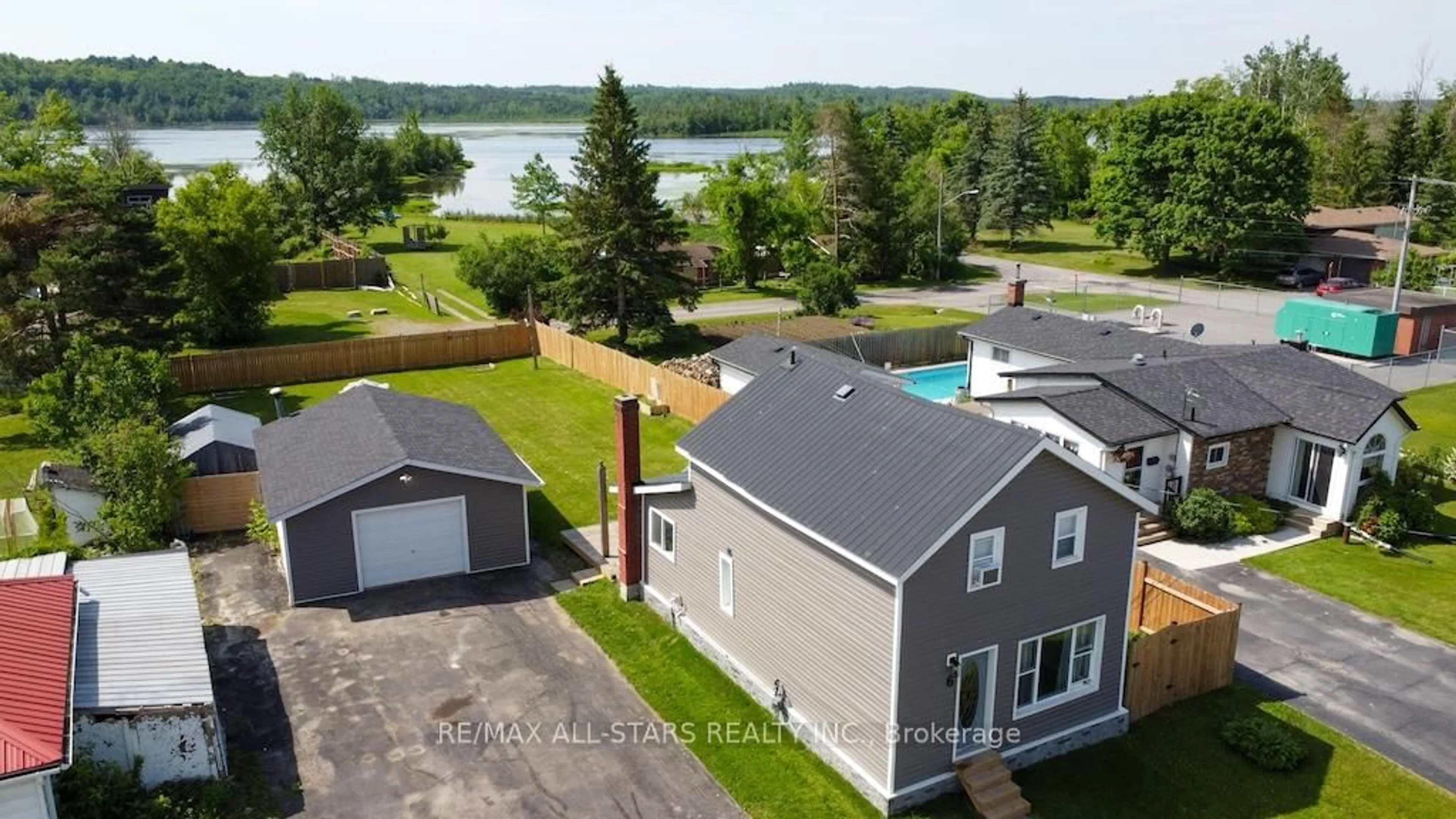A pic from outside/outdoor area/front of a property/back of a property/a pic from drone, water/lake/river/ocean view for 6 Mary St, Kawartha Lakes Ontario K0L 2W0