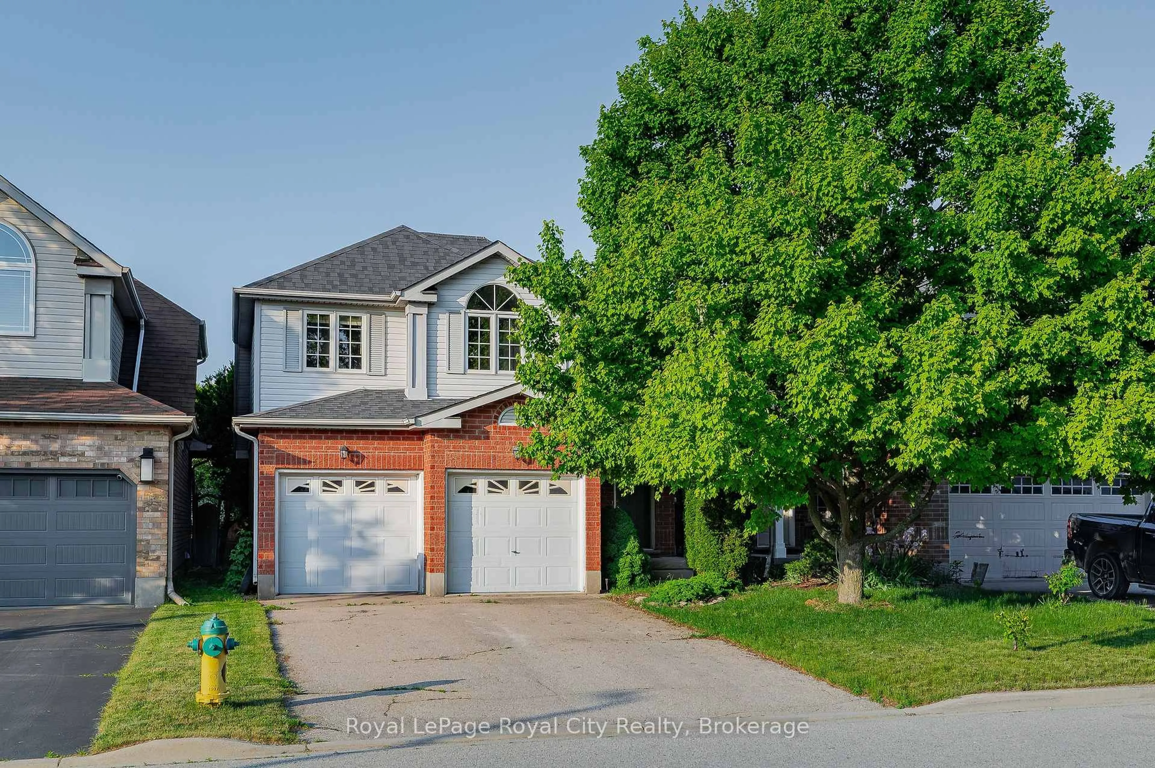 Home with brick exterior material, street for 15 Camm Cres, Guelph Ontario N1L 1J9