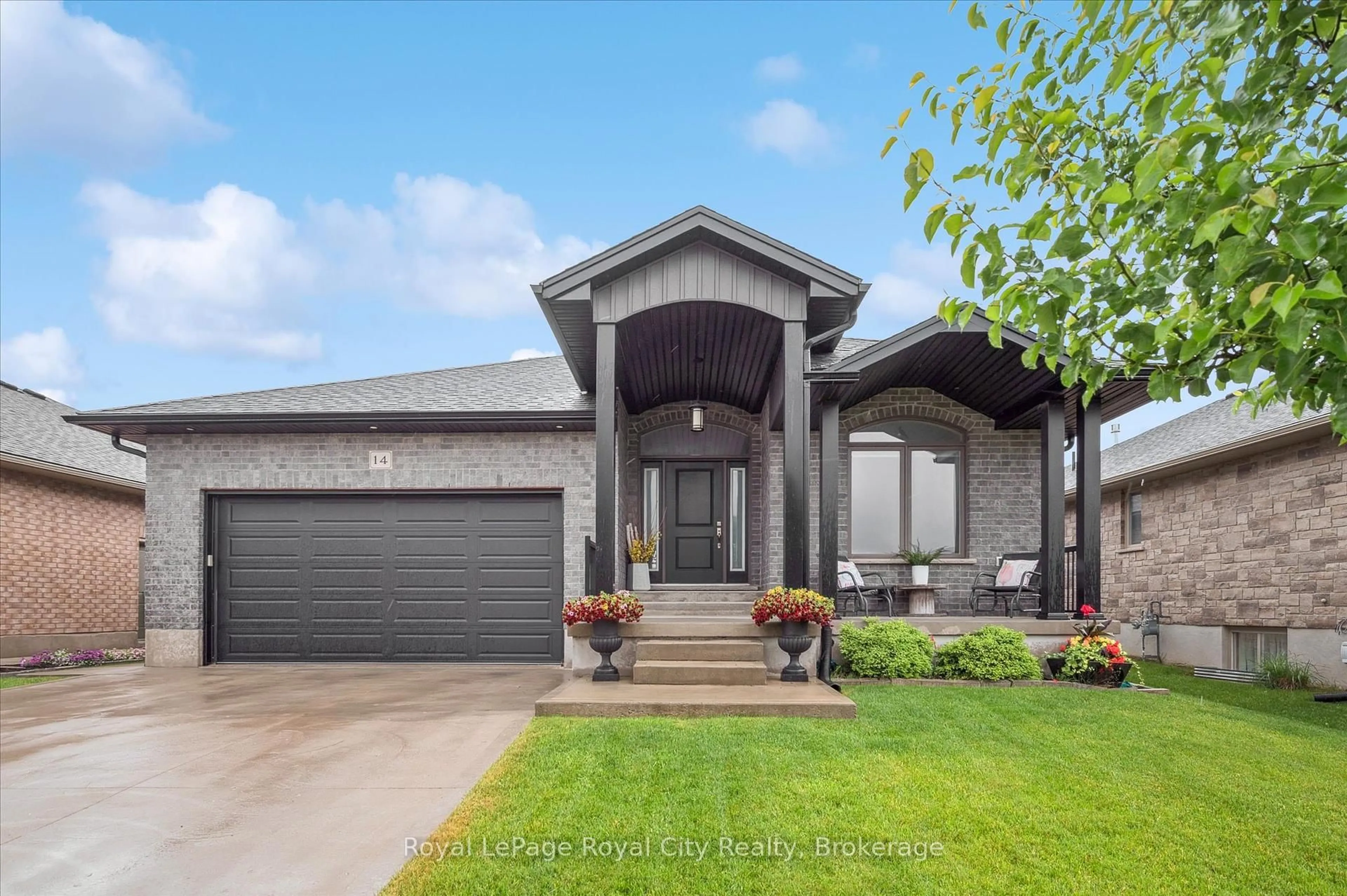 Home with brick exterior material, street for 14 Howard Cres, Centre Wellington Ontario N1M 0E9