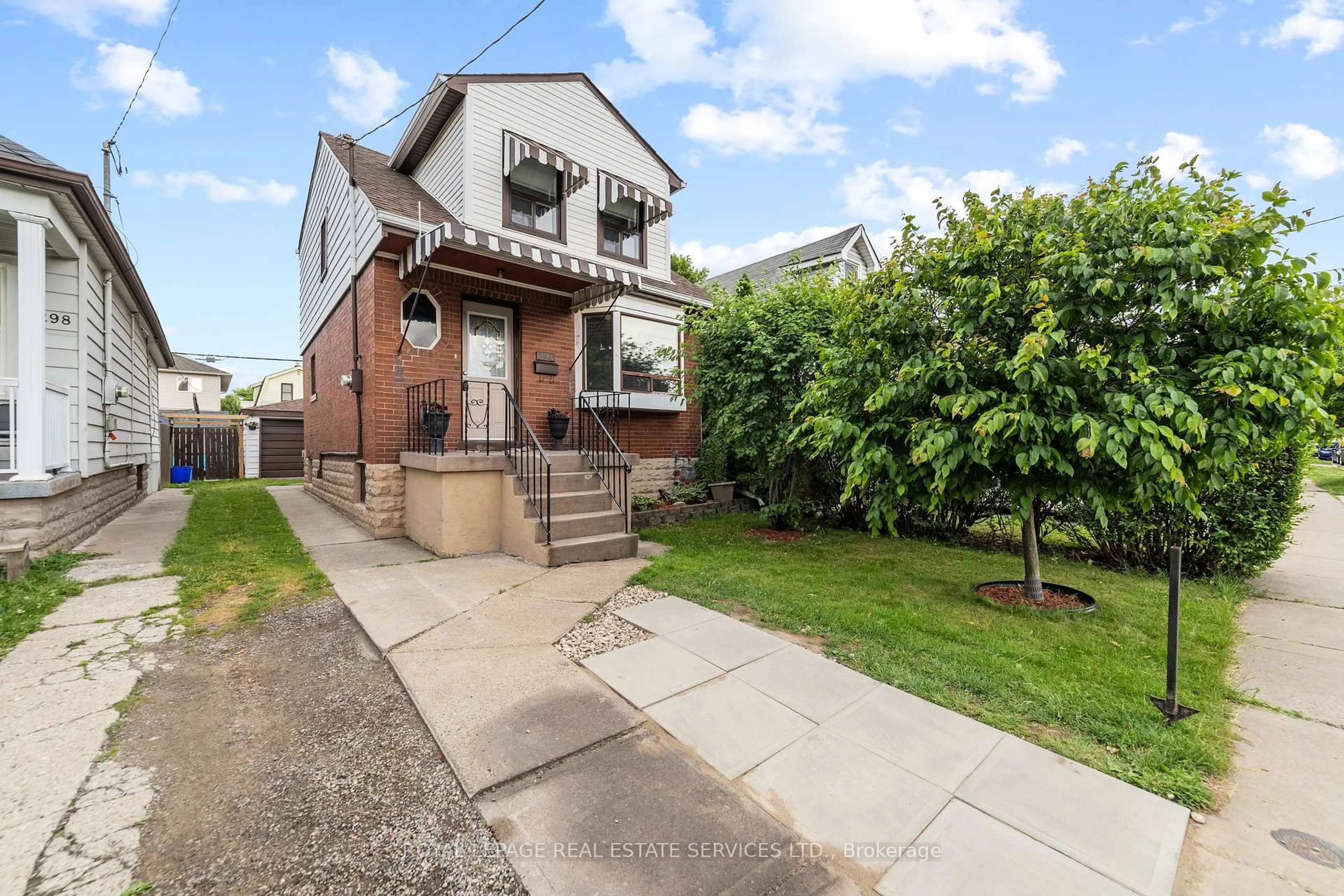 Home with brick exterior material, street for 294 Cope St, Hamilton Ontario L8H 5B5
