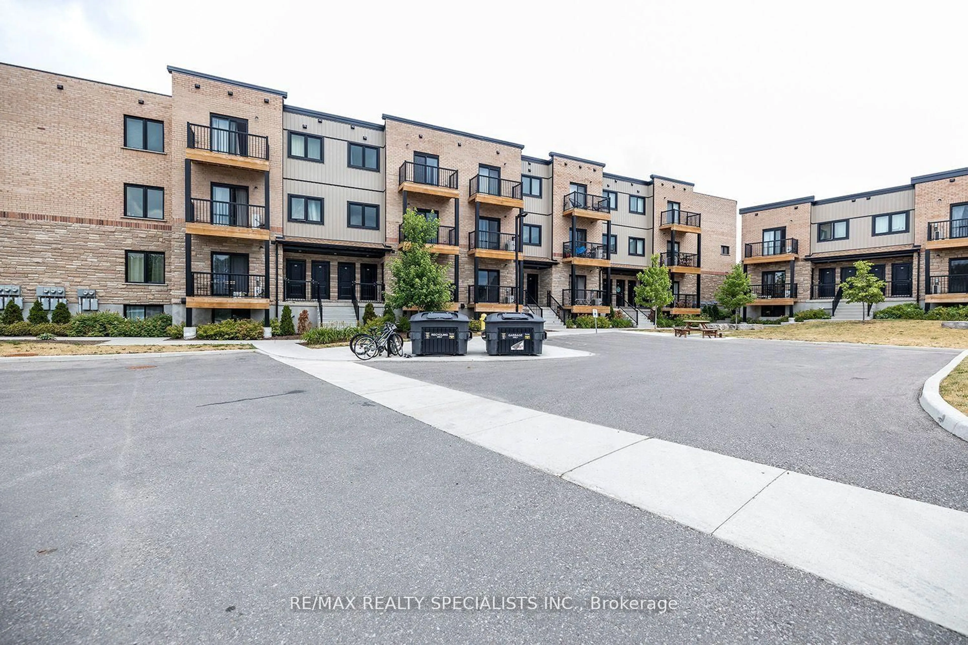 A pic from outside/outdoor area/front of a property/back of a property/a pic from drone, street for 164 Heiman St #7A, Kitchener Ontario N2M 0B8