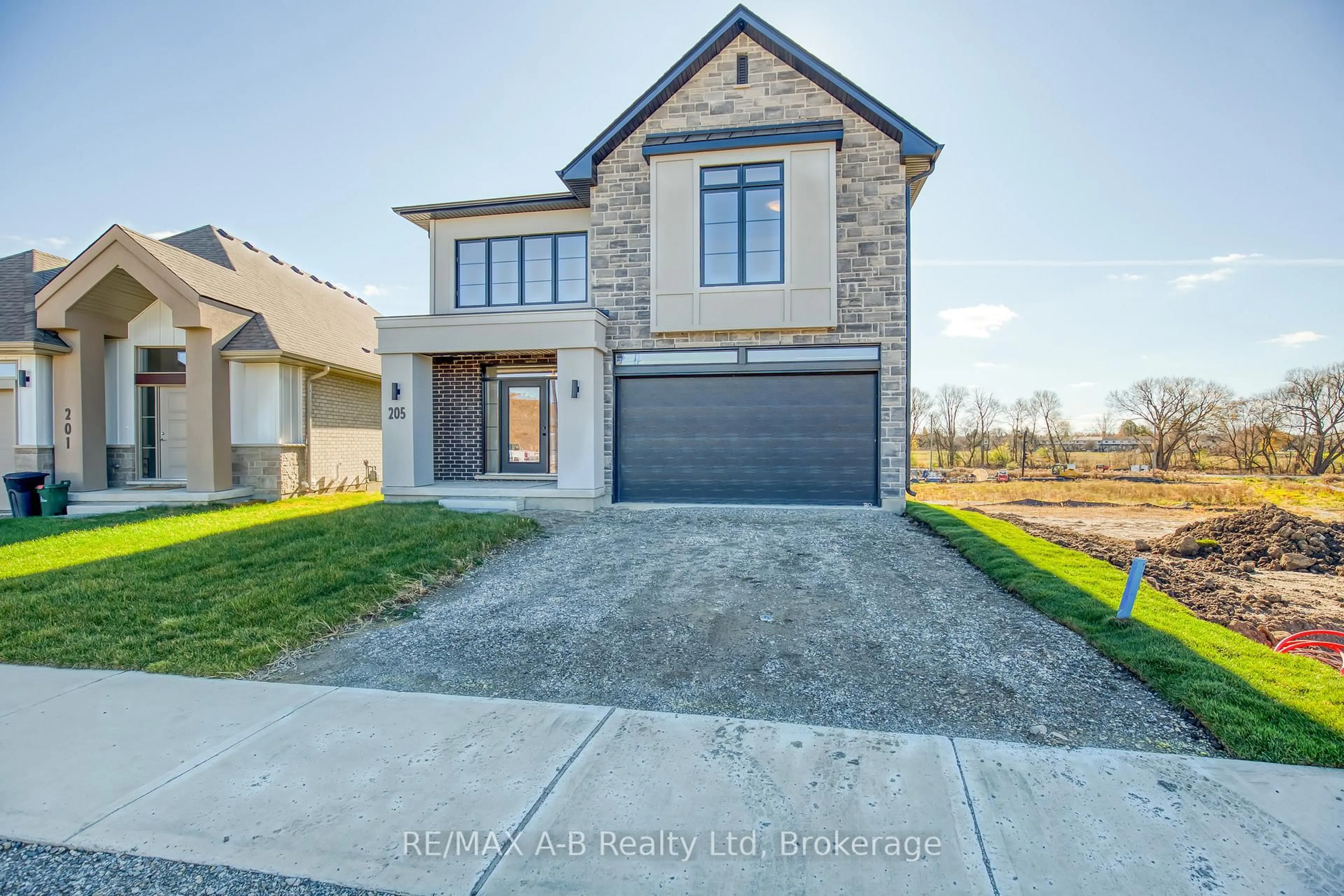 Home with brick exterior material, street for Lot 24 205 Dempsey Dr, Stratford Ontario N5A 0K5