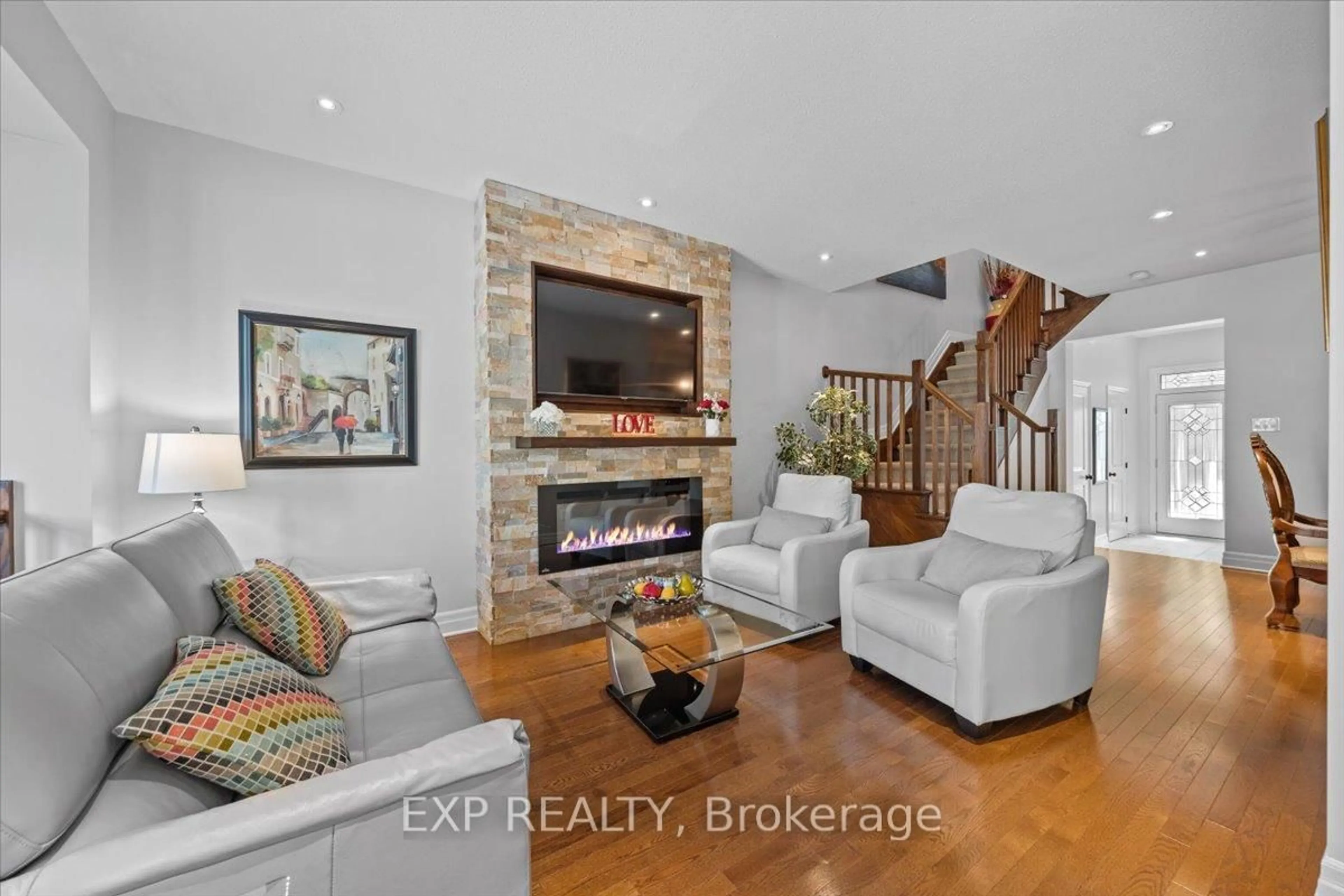 Living room with furniture, ceramic/tile floor for 970 Caldermill Private, Ottawa Ontario K2J 0Z7