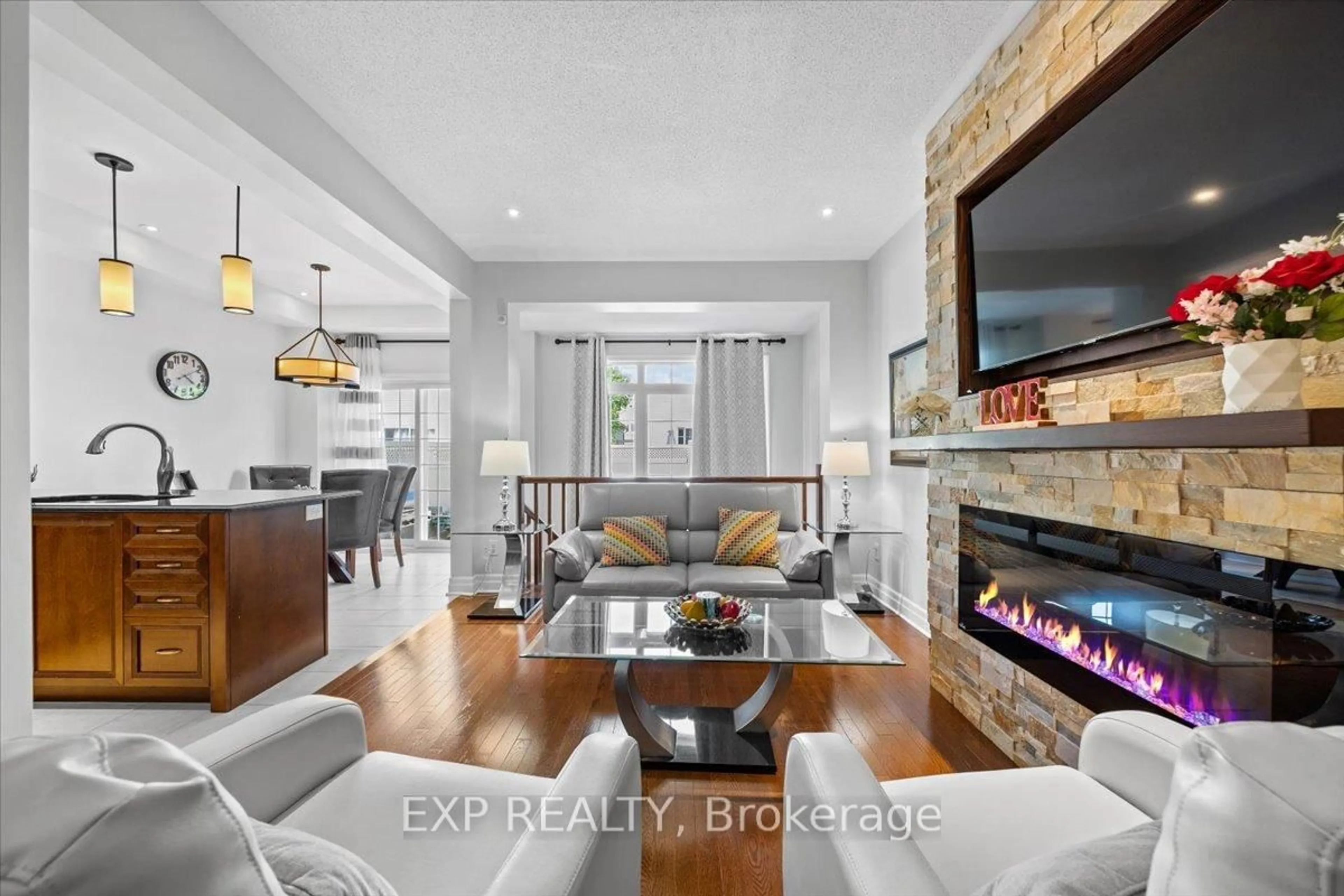 Living room with furniture, ceramic/tile floor for 970 Caldermill Private, Ottawa Ontario K2J 0Z7
