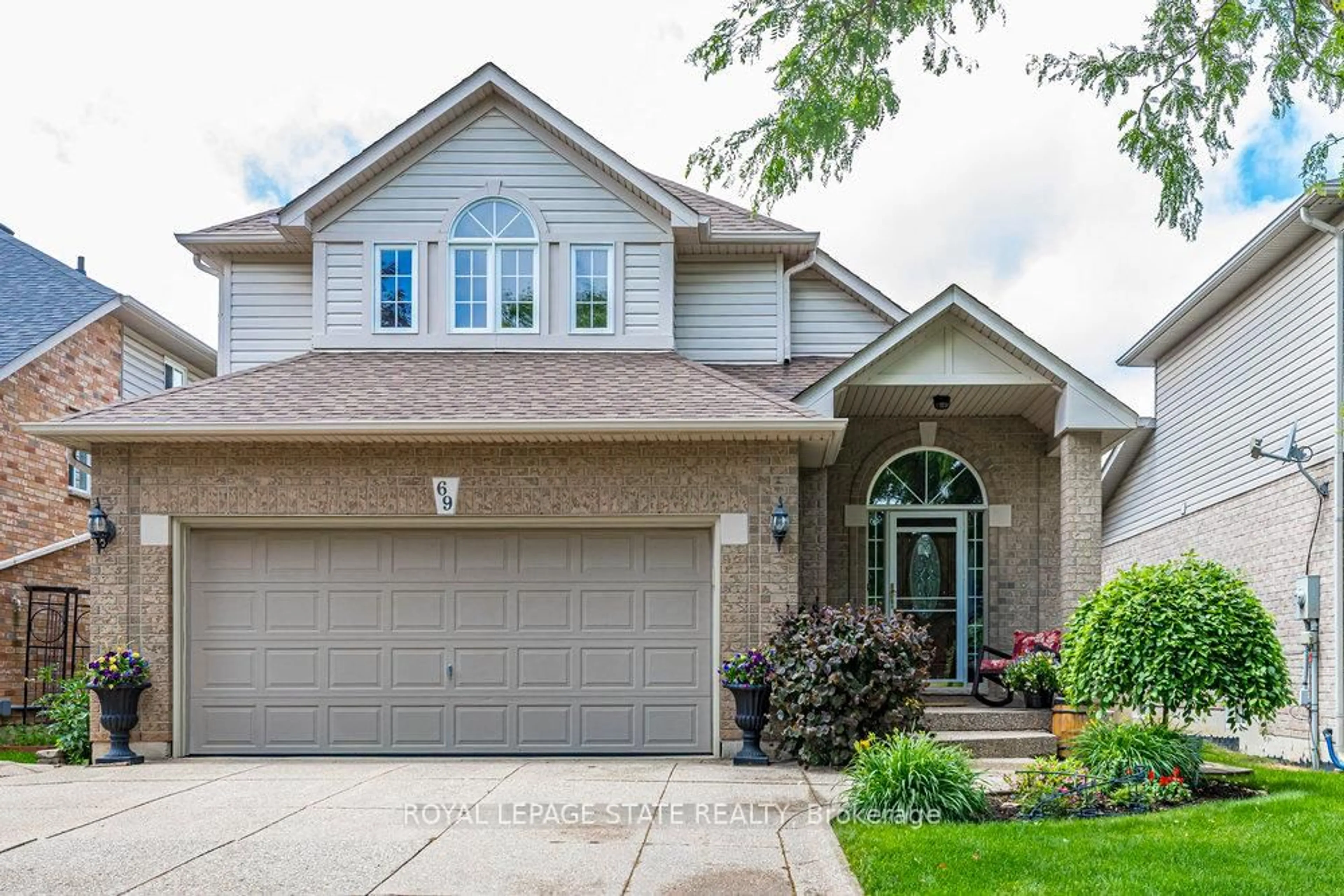 Home with vinyl exterior material, street for 69 Brookheath Lane, Hamilton Ontario L0R 1W0