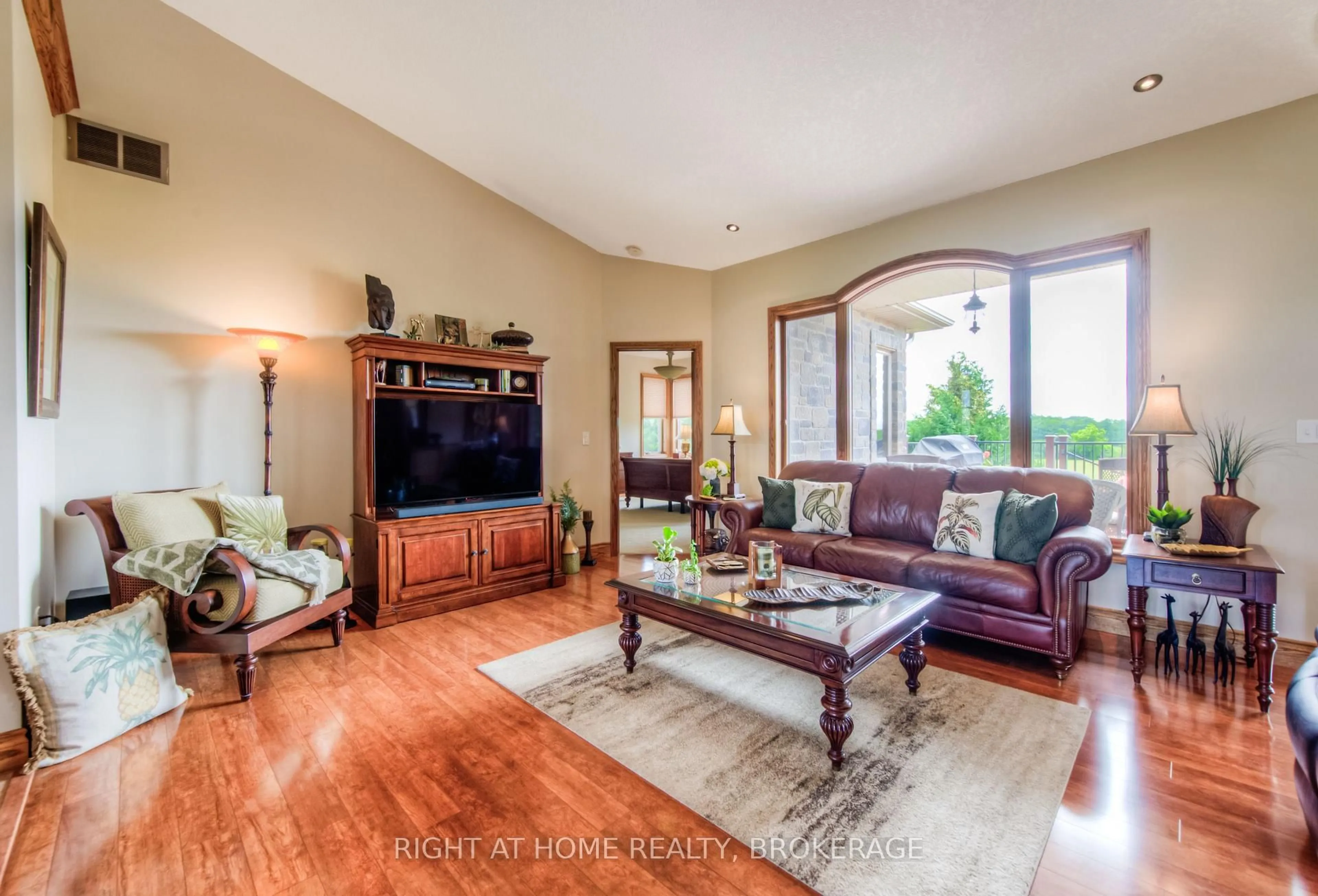 Living room with furniture, wood/laminate floor for 2567 Morrison Rd, North Dumfries Ontario N1R 5S2