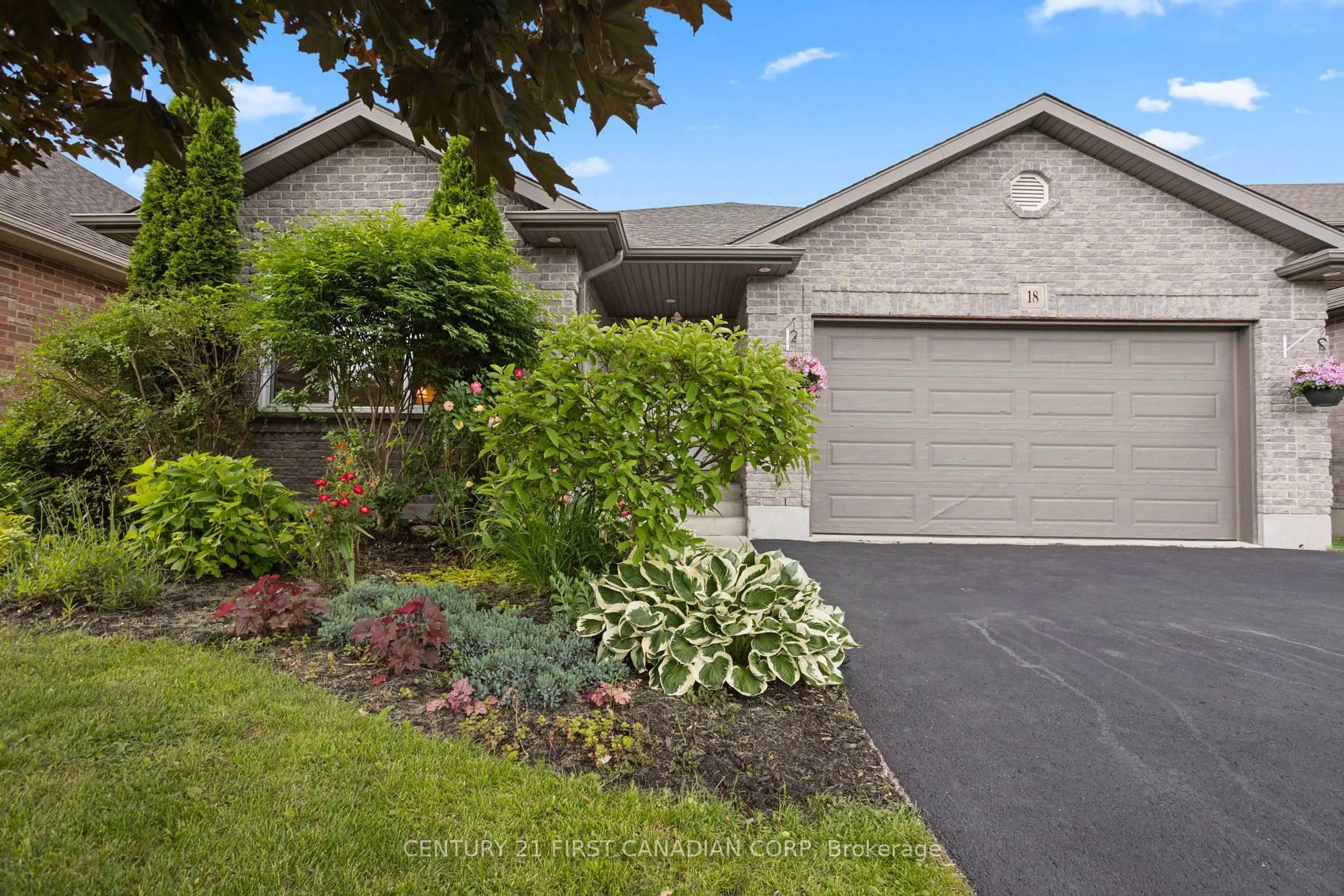 Home with brick exterior material, street for 18 Trillium Cres, St. Marys Ontario N4X 0A2