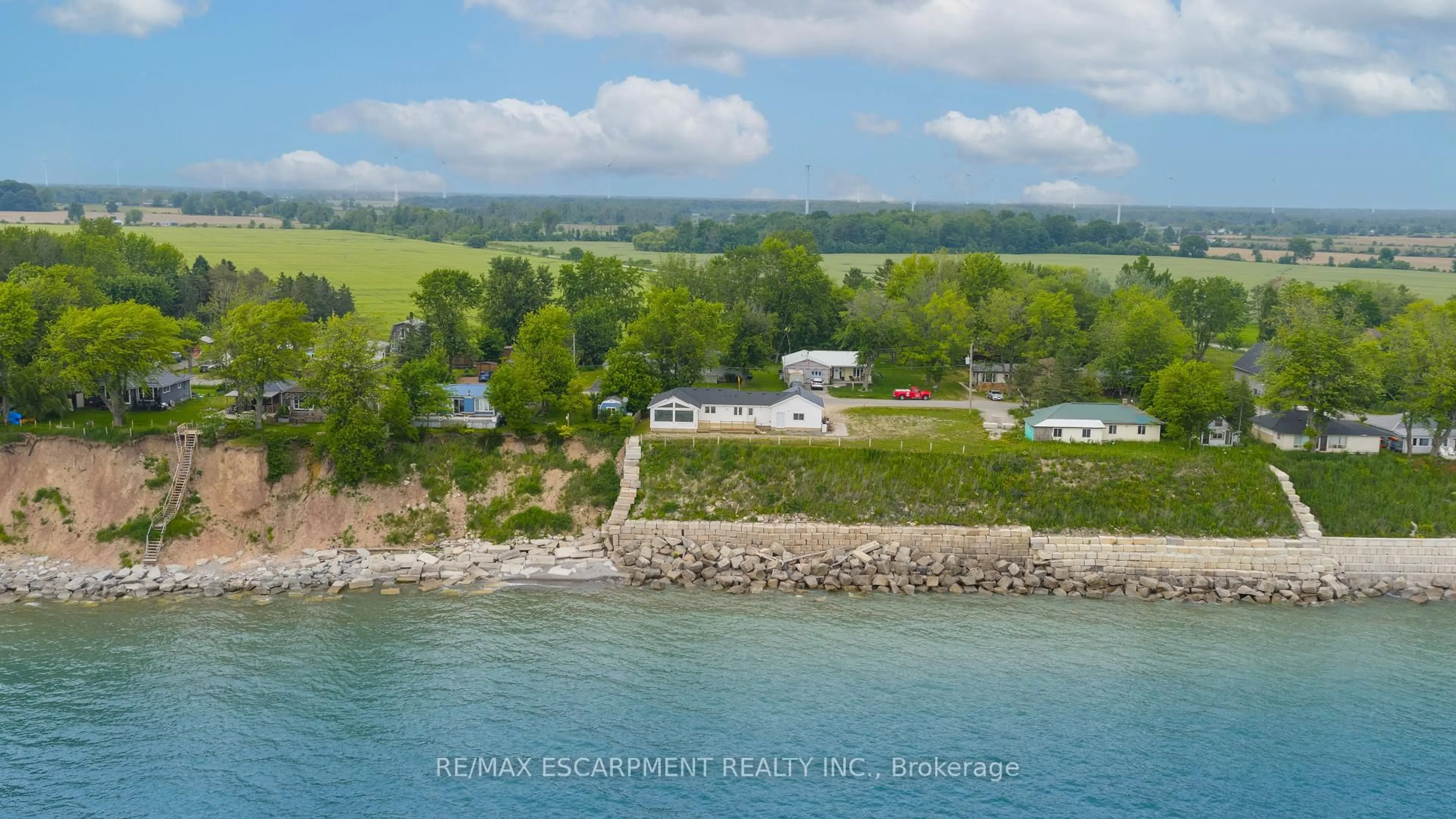 A pic from outside/outdoor area/front of a property/back of a property/a pic from drone, water/lake/river/ocean view for 21 Villella Rd, Haldimand Ontario N0A 1K0