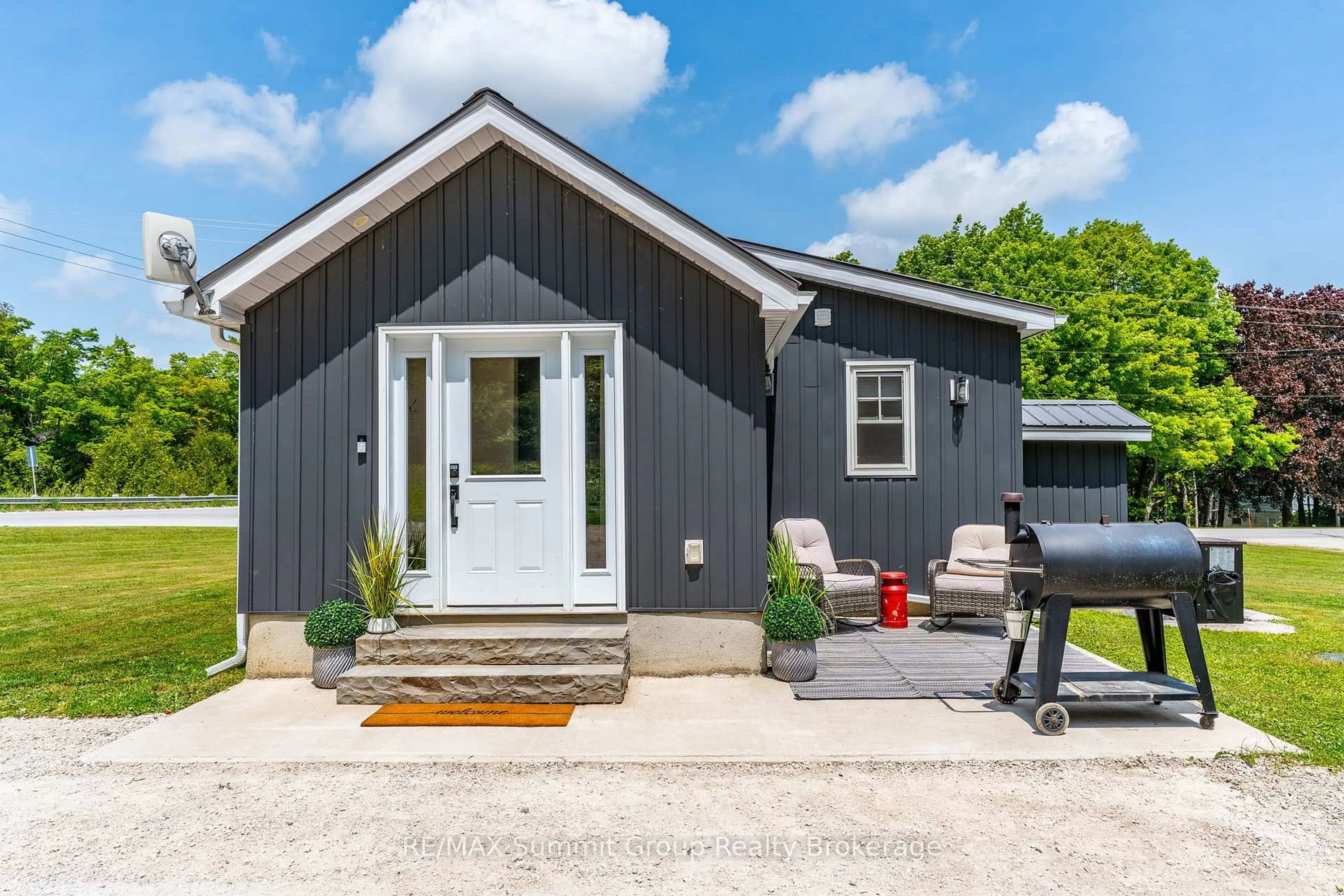 Home with vinyl exterior material, street for 494255 Grey Road 2, Grey Highlands Ontario N0C 1C0