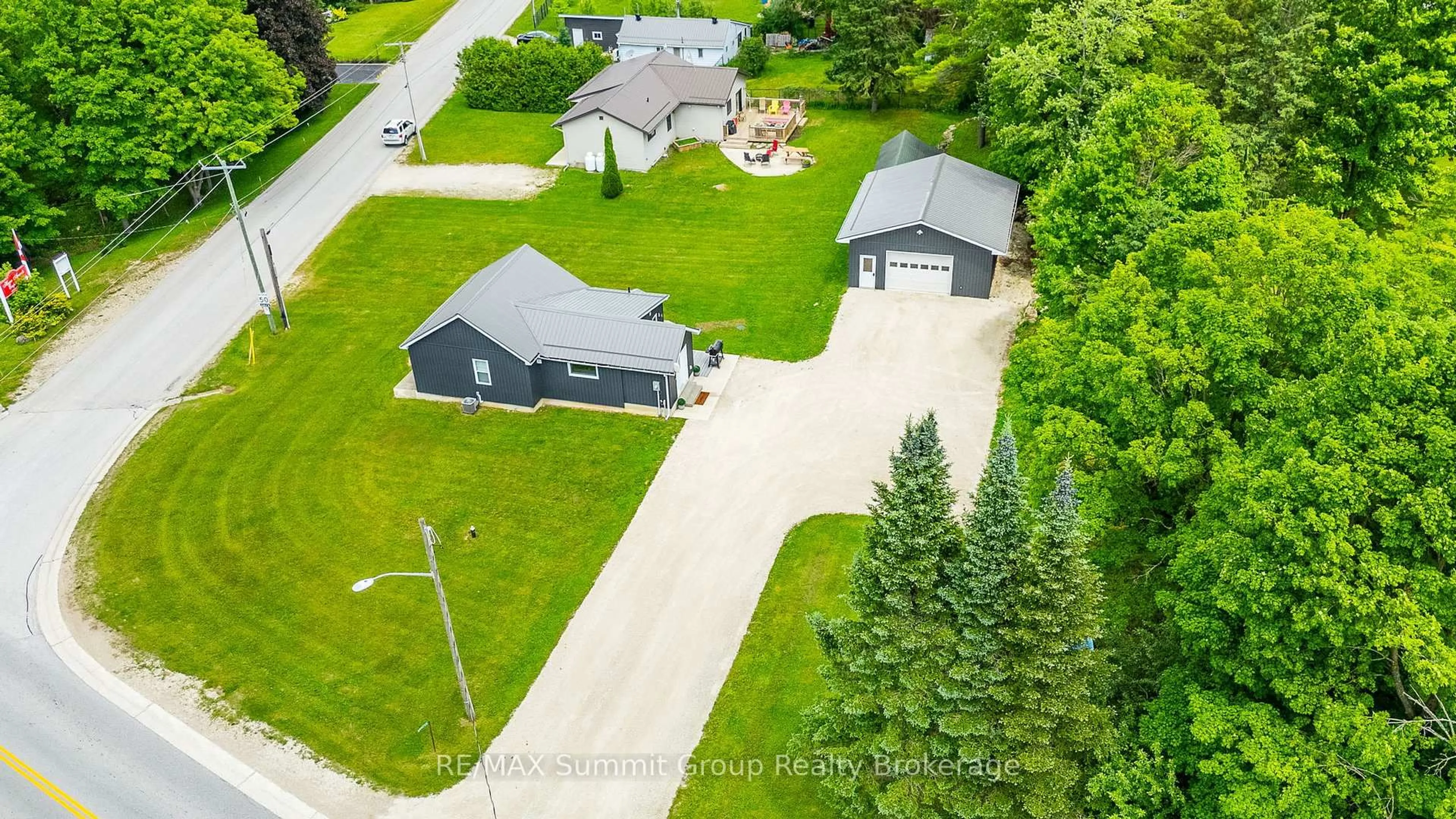 A pic from outside/outdoor area/front of a property/back of a property/a pic from drone, street for 494255 Grey Road 2, Grey Highlands Ontario N0C 1C0