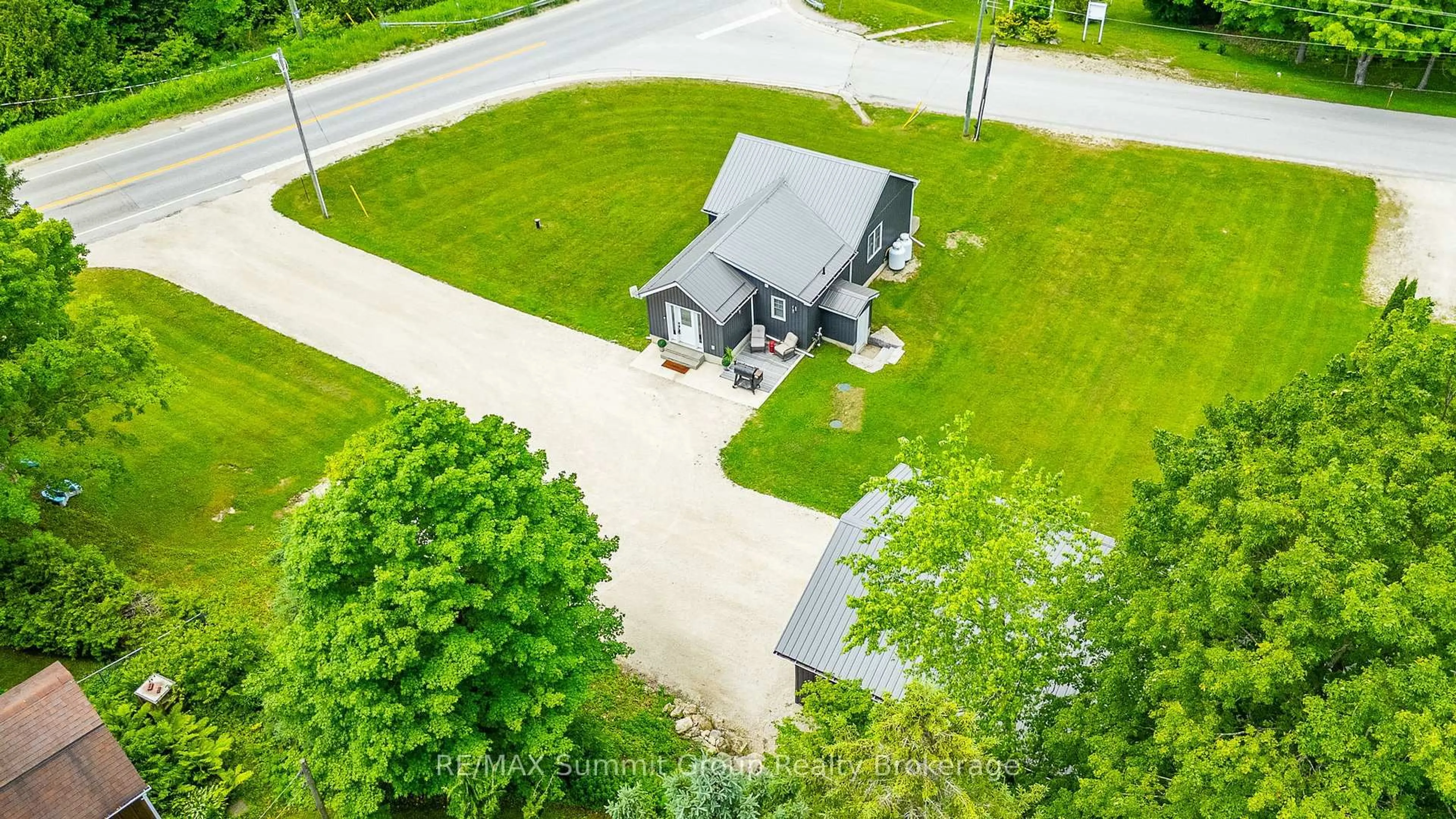 A pic from outside/outdoor area/front of a property/back of a property/a pic from drone, street for 494255 Grey Road 2, Grey Highlands Ontario N0C 1C0