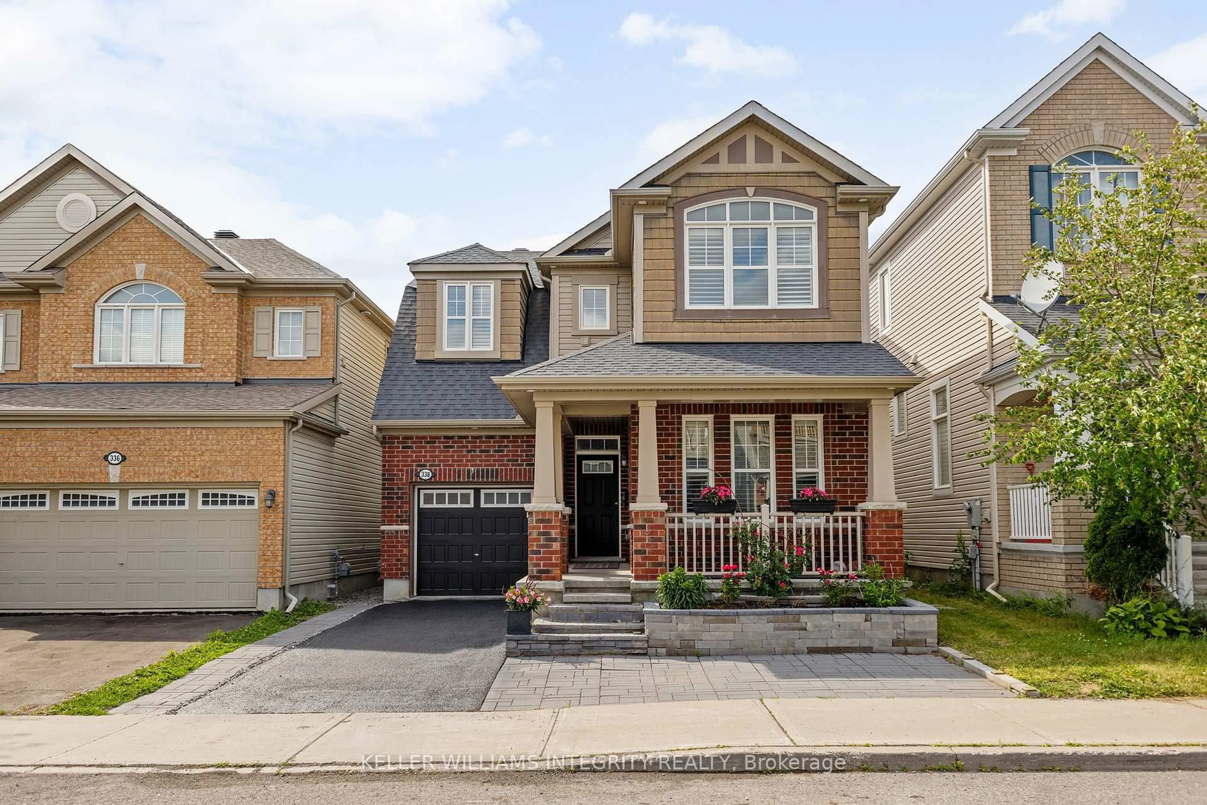 Home with brick exterior material, street for 338 Gallantry Way, Ottawa Ontario K2S 0P6