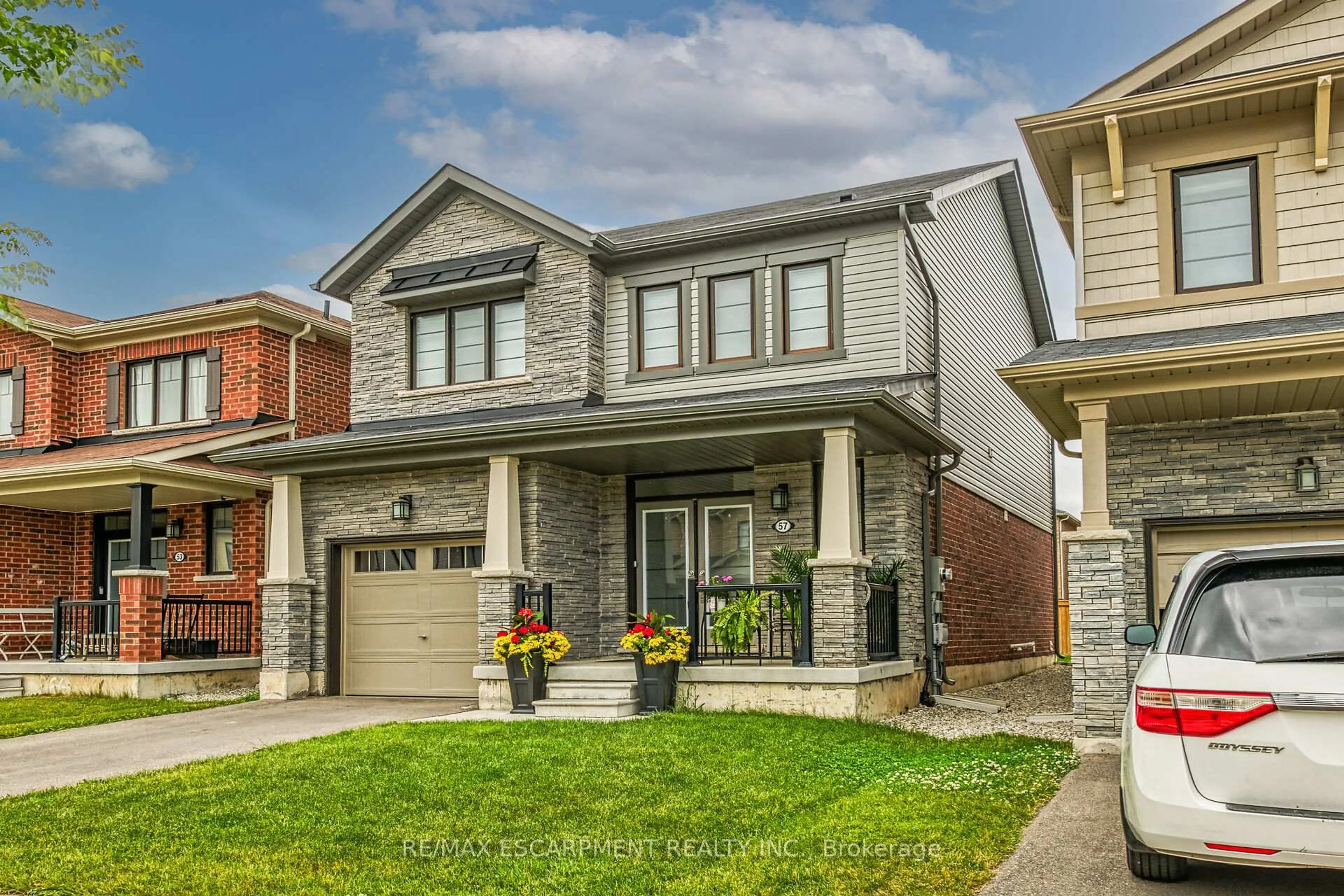 Home with brick exterior material, street for 57 Queen Mary Blvd, Hamilton Ontario L8J 0M4