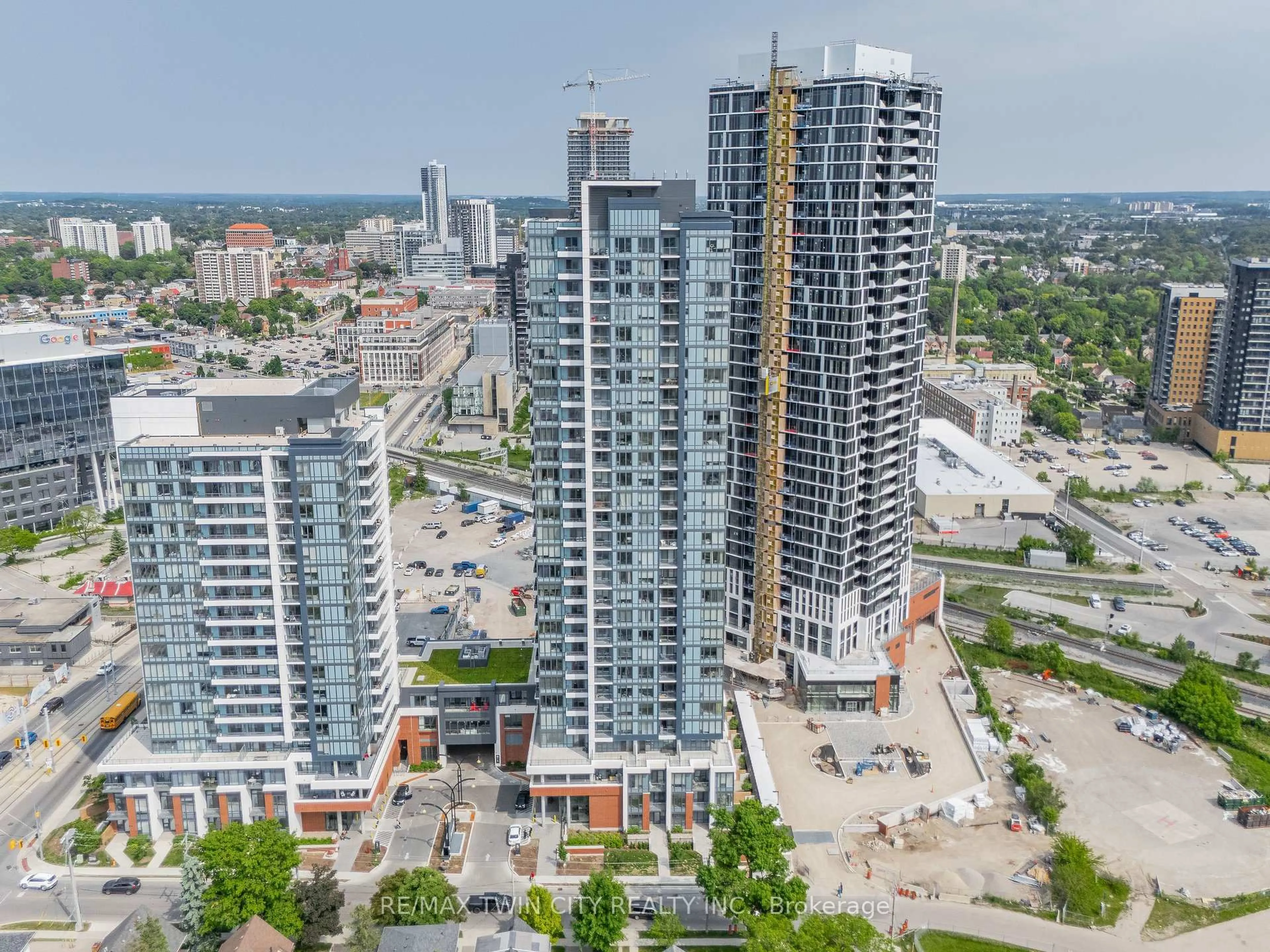 A pic from outside/outdoor area/front of a property/back of a property/a pic from drone, city buildings view from balcony for 15 Wellington St #309, Kitchener Ontario N2G 0E4