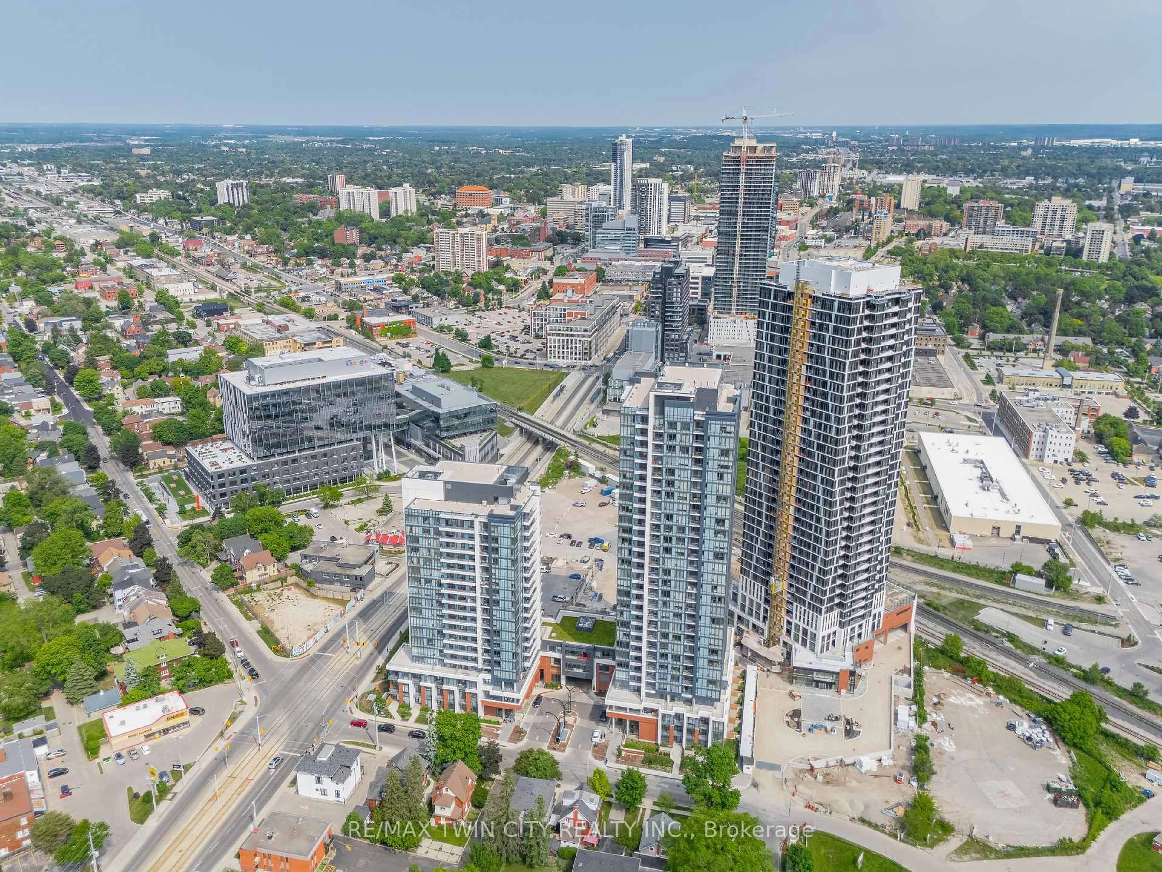 A pic from outside/outdoor area/front of a property/back of a property/a pic from drone, city buildings view from balcony for 15 Wellington St #309, Kitchener Ontario N2G 0E4