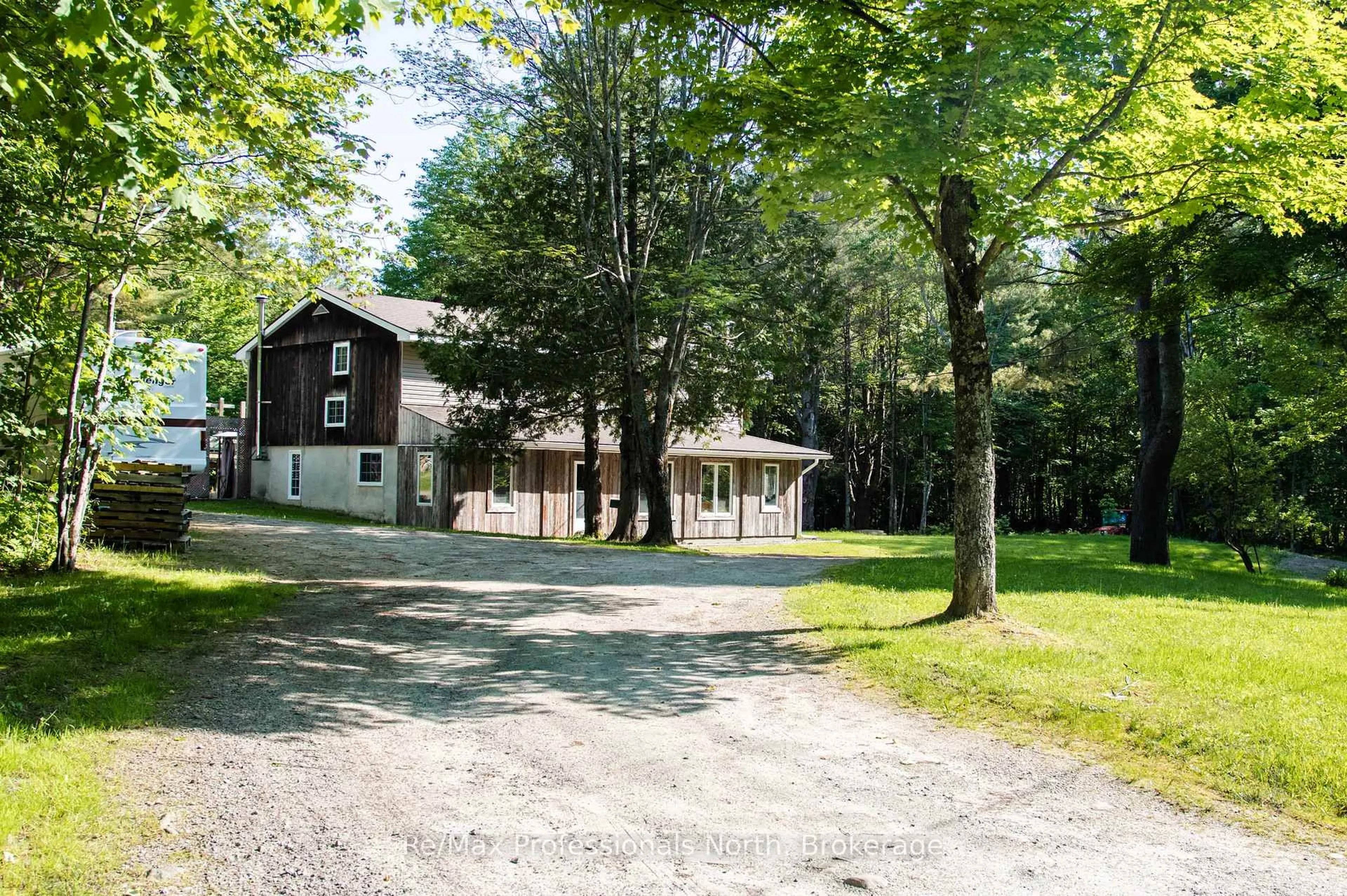 A pic from outside/outdoor area/front of a property/back of a property/a pic from drone, street for 1397 Old Parry Sound Rd, Muskoka Lakes Ontario P0B 1M0
