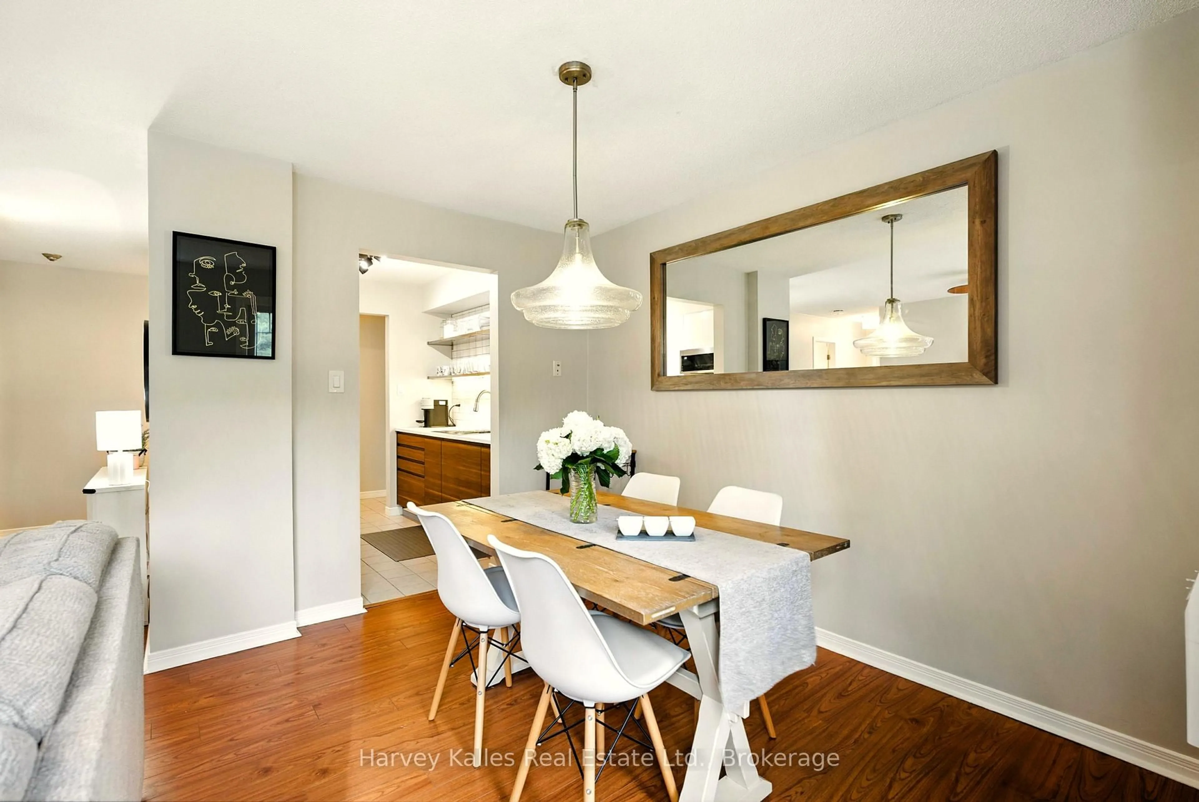 Dining room, wood/laminate floor for 661 Cedar Lane #202C, Bracebridge Ontario P1L 1N9