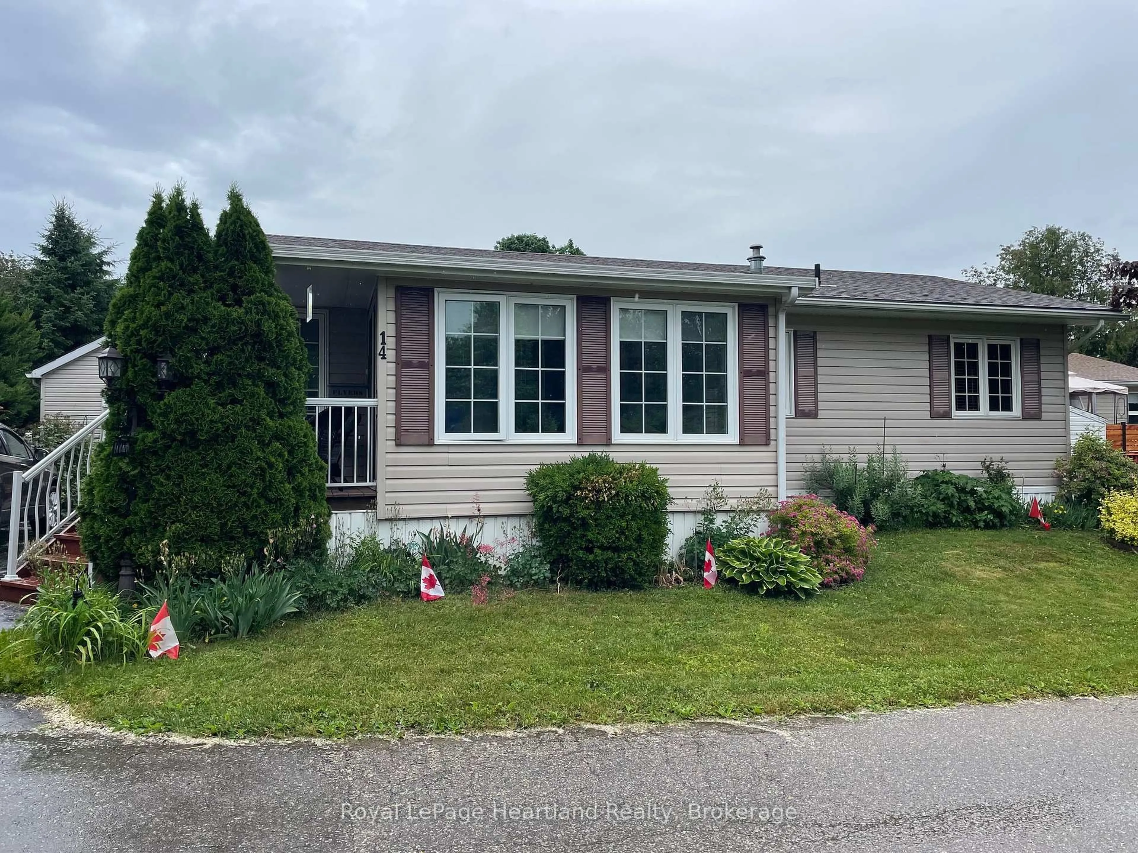 Home with vinyl exterior material, street for 14 GARDEN Rd, Ashfield-Colborne-Wawanosh Ontario N7A 3Y3