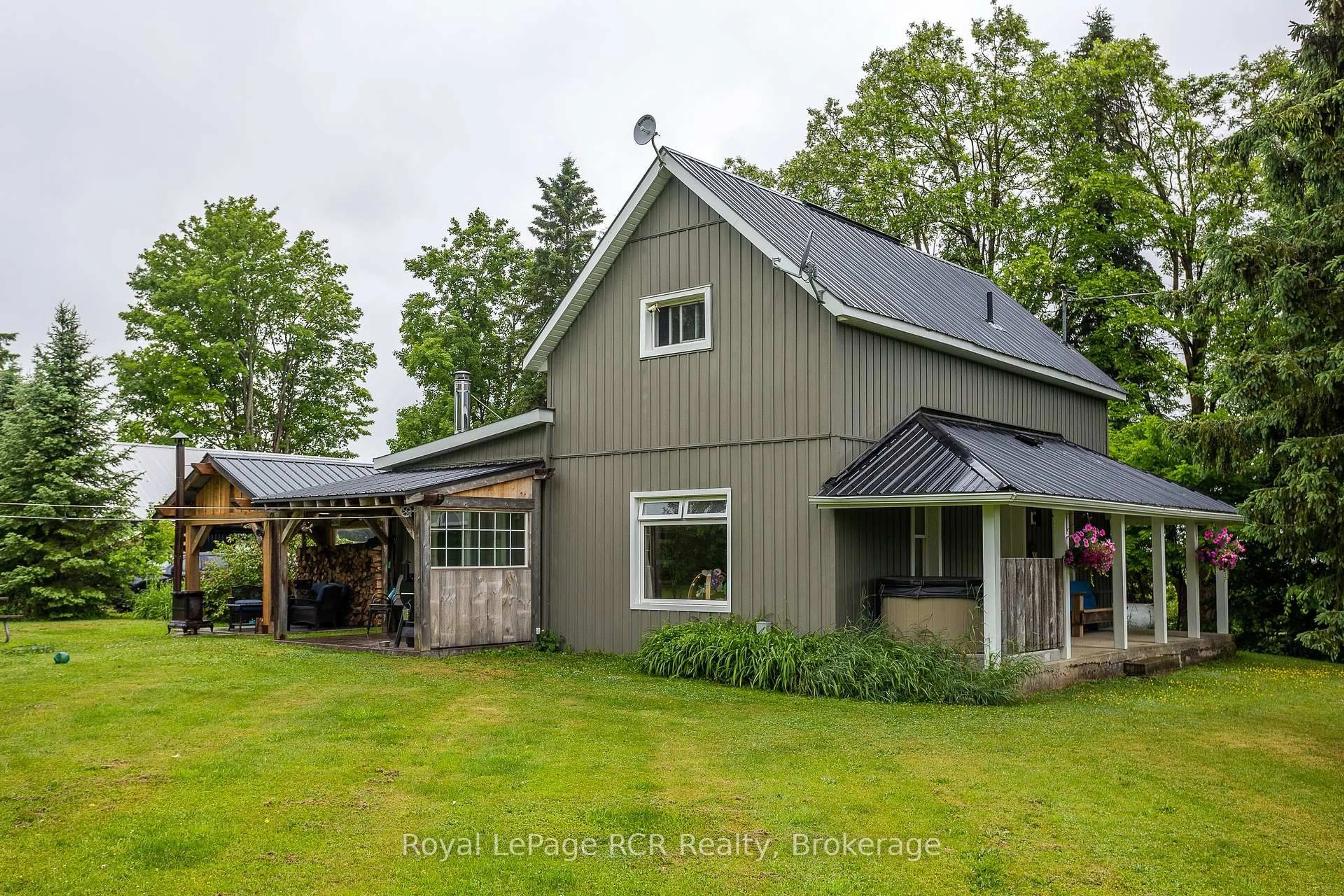A pic from outside/outdoor area/front of a property/back of a property/a pic from drone, unknown for 773760 Highway 10, Grey Highlands Ontario N0C 1L0