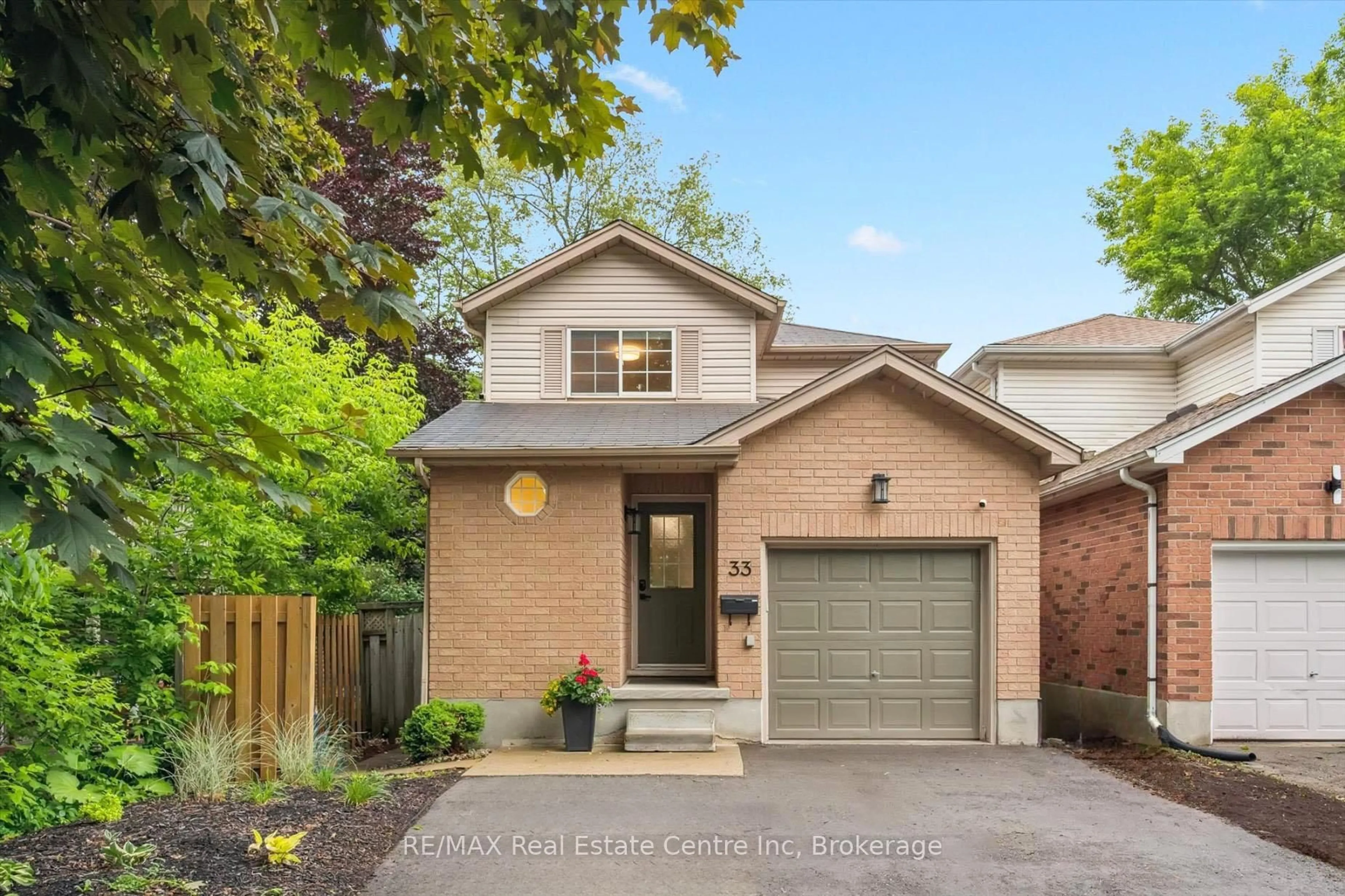 Home with brick exterior material, street for 33 LONDON Rd, Guelph Ontario N1H 2B2