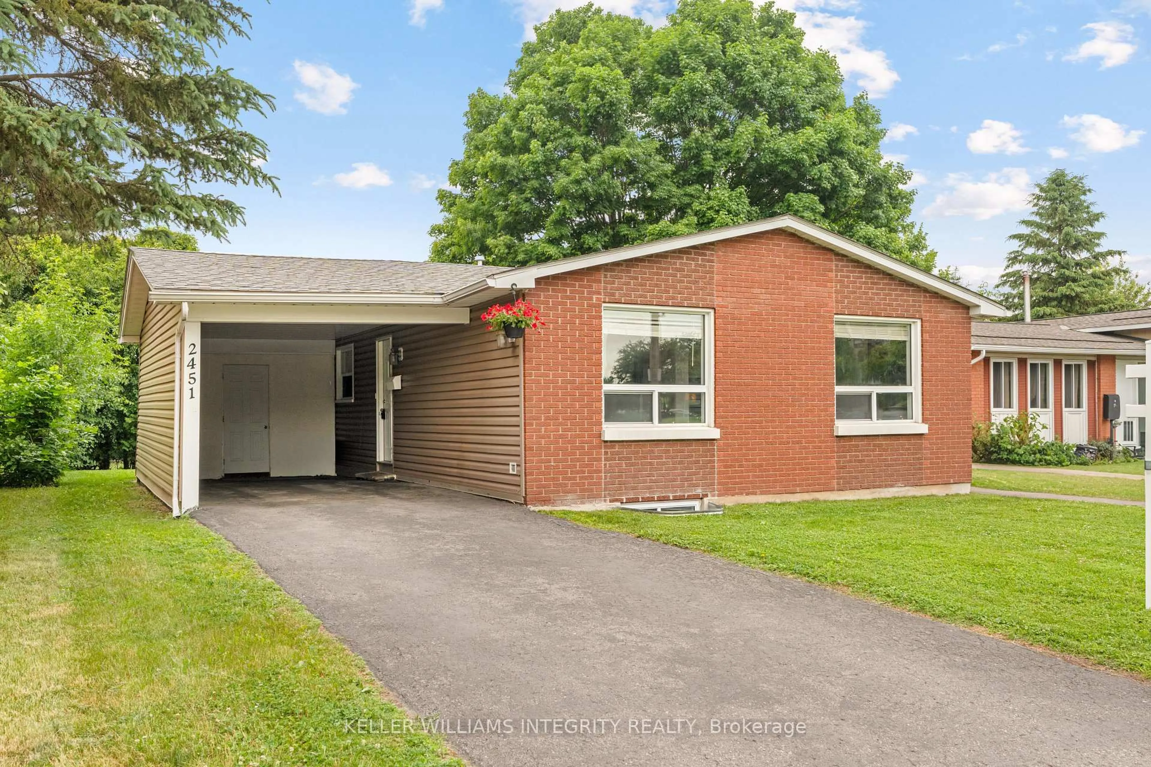 Home with brick exterior material, street for 2451 Southvale Cres, Ottawa Ontario K1B 4H6