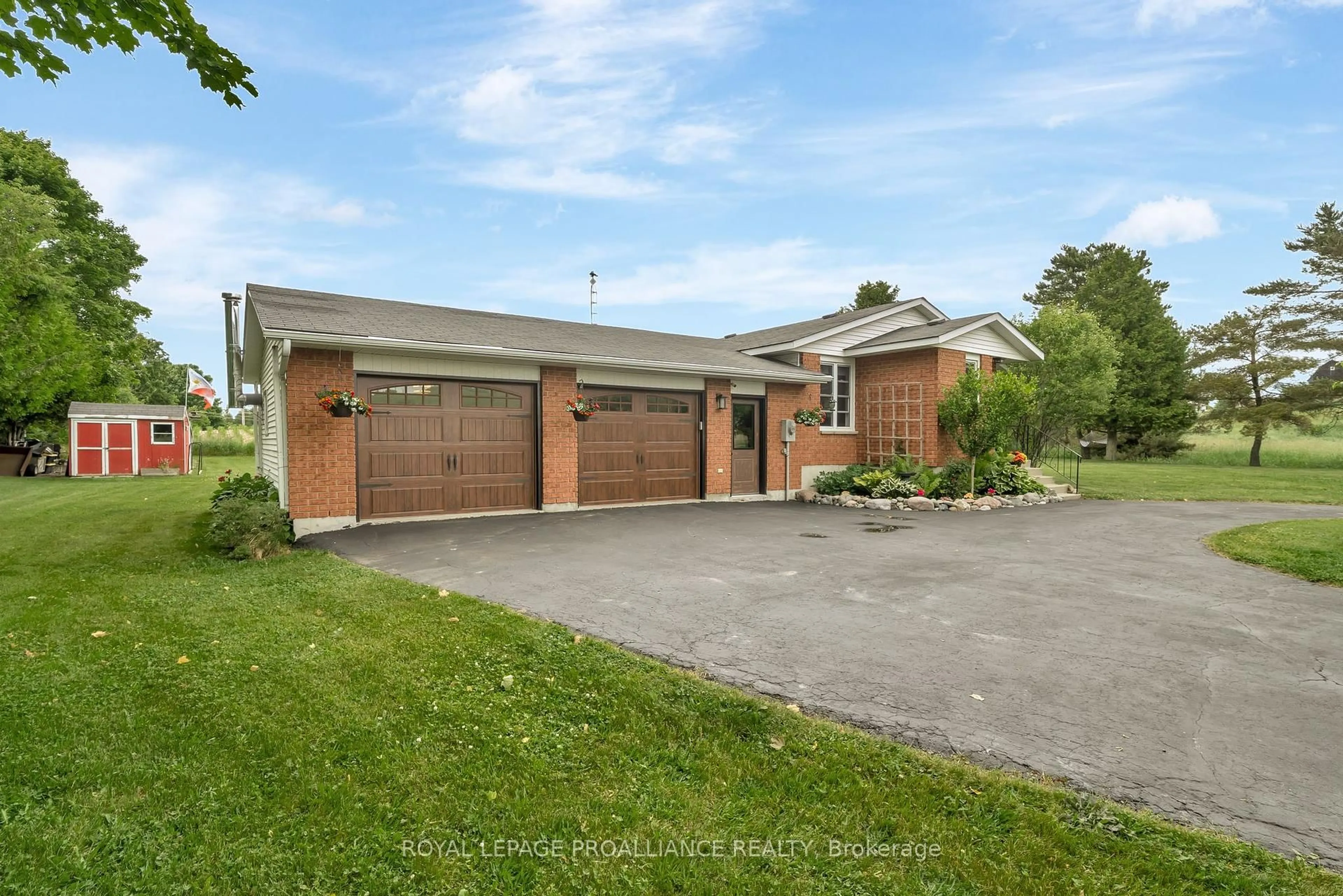 A pic from outside/outdoor area/front of a property/back of a property/a pic from drone, street for 15148 County Road 21, Brighton Ontario K0K 1H0