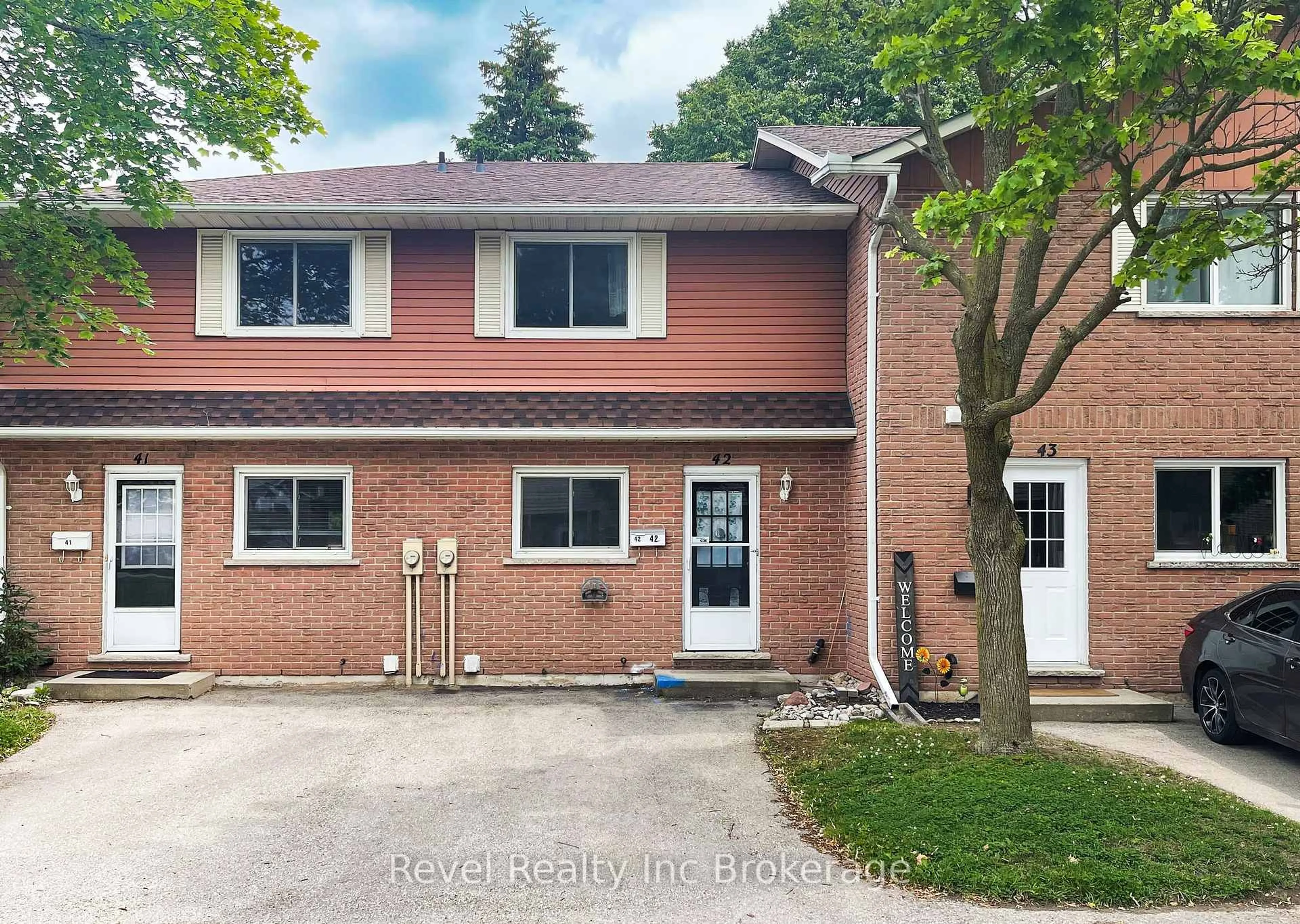 Home with brick exterior material, street for 1063 Nellis St #42, Woodstock Ontario N4S 8P2
