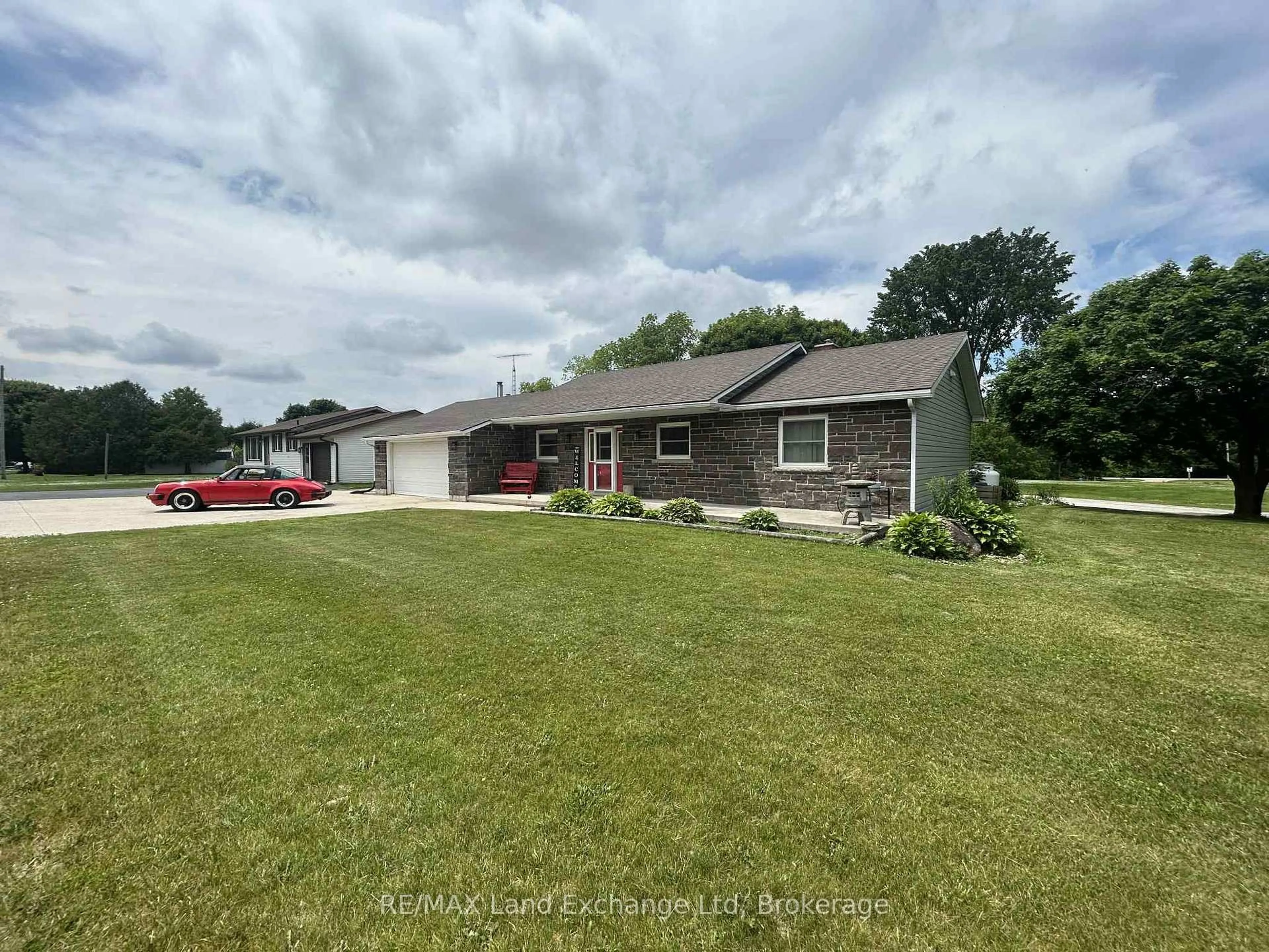 A pic from outside/outdoor area/front of a property/back of a property/a pic from drone, water/lake/river/ocean view for 1041 Main St, Howick Ontario N0G 2X0