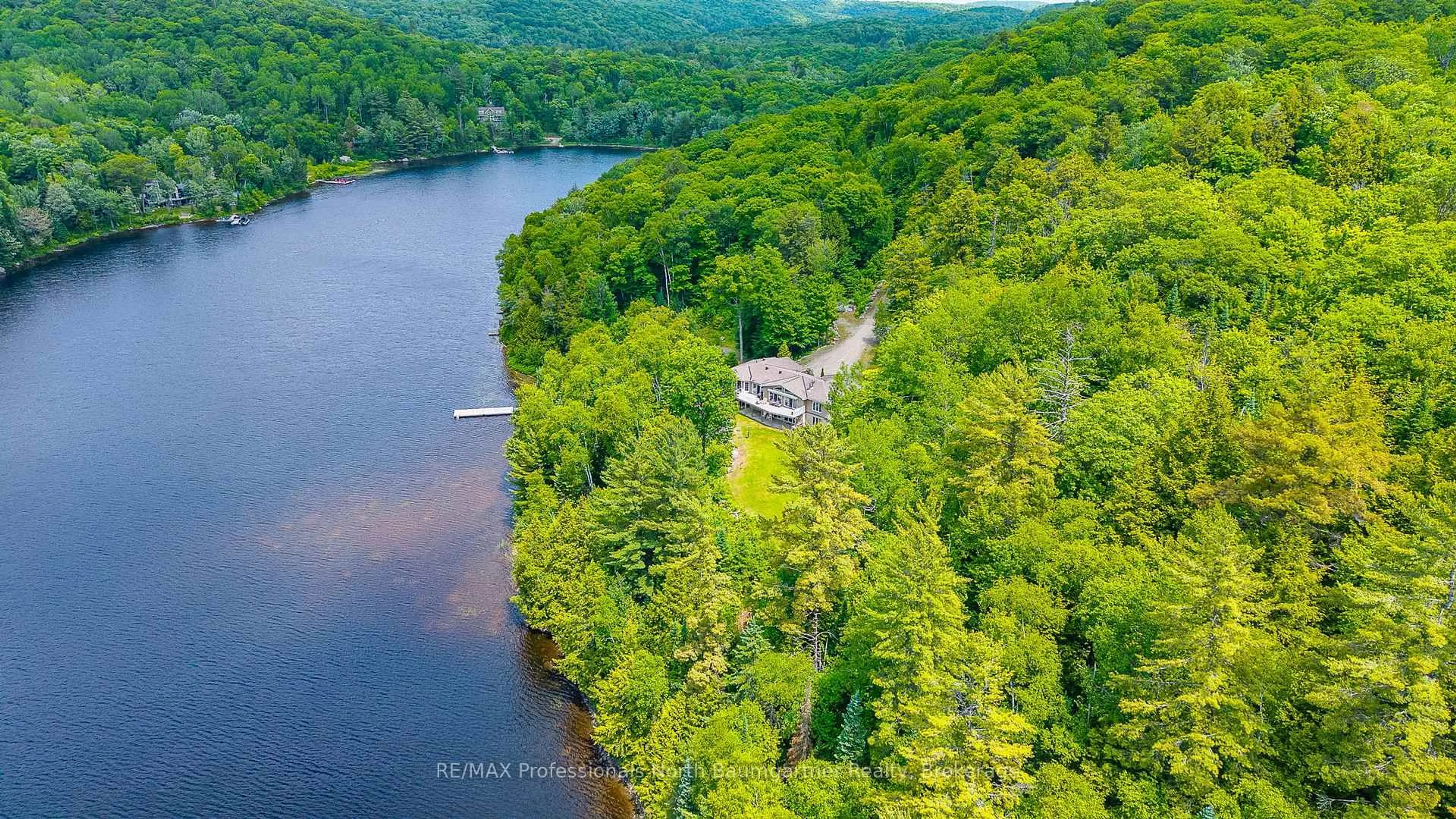 A pic from outside/outdoor area/front of a property/back of a property/a pic from drone, water/lake/river/ocean view for 1132 Trapline Tr, Dysart et al Ontario K0M 1S0