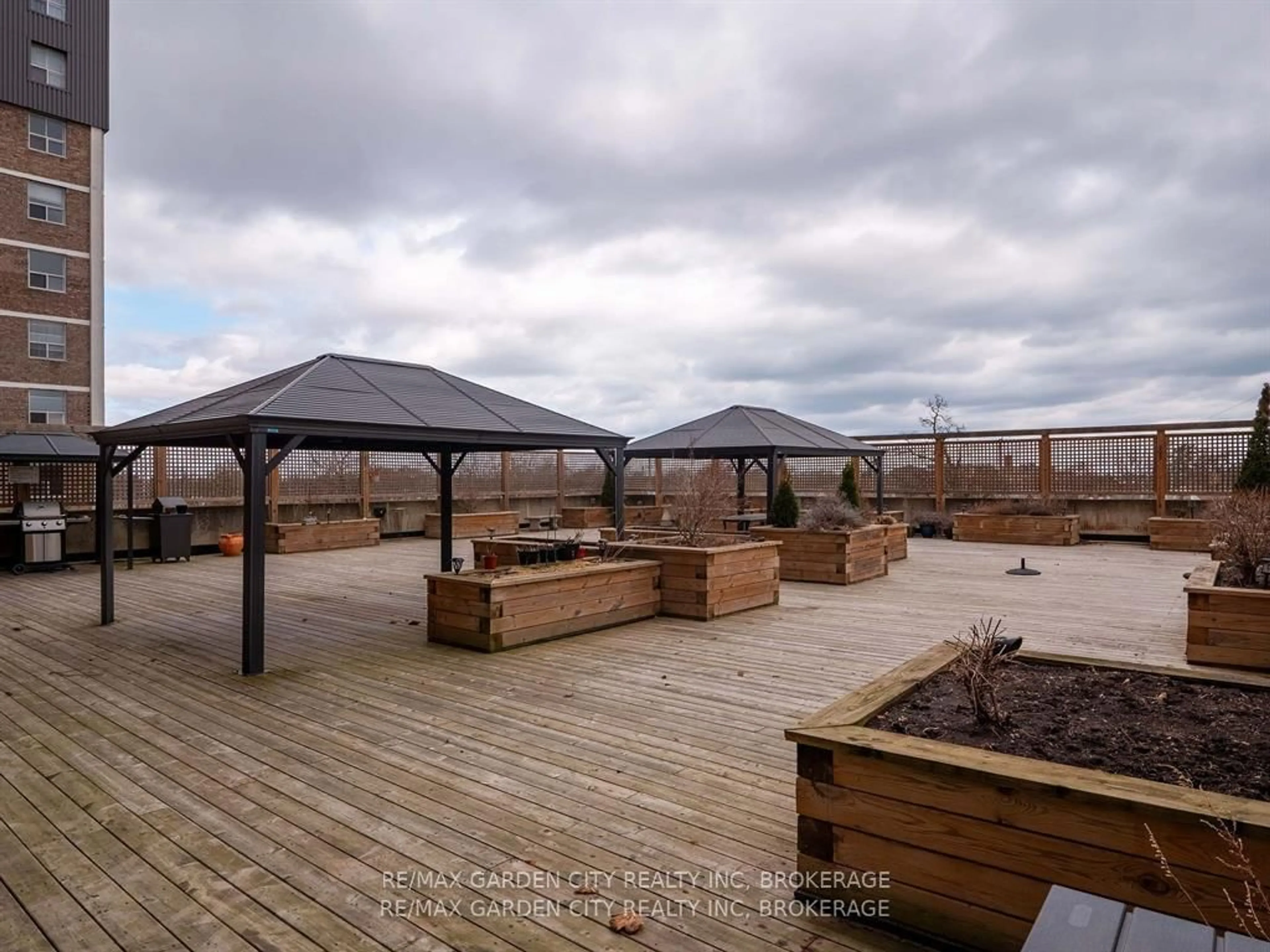 A pic from outside/outdoor area/front of a property/back of a property/a pic from drone, unknown for 141 Church St #304, St. Catharines Ontario L2R 7L7