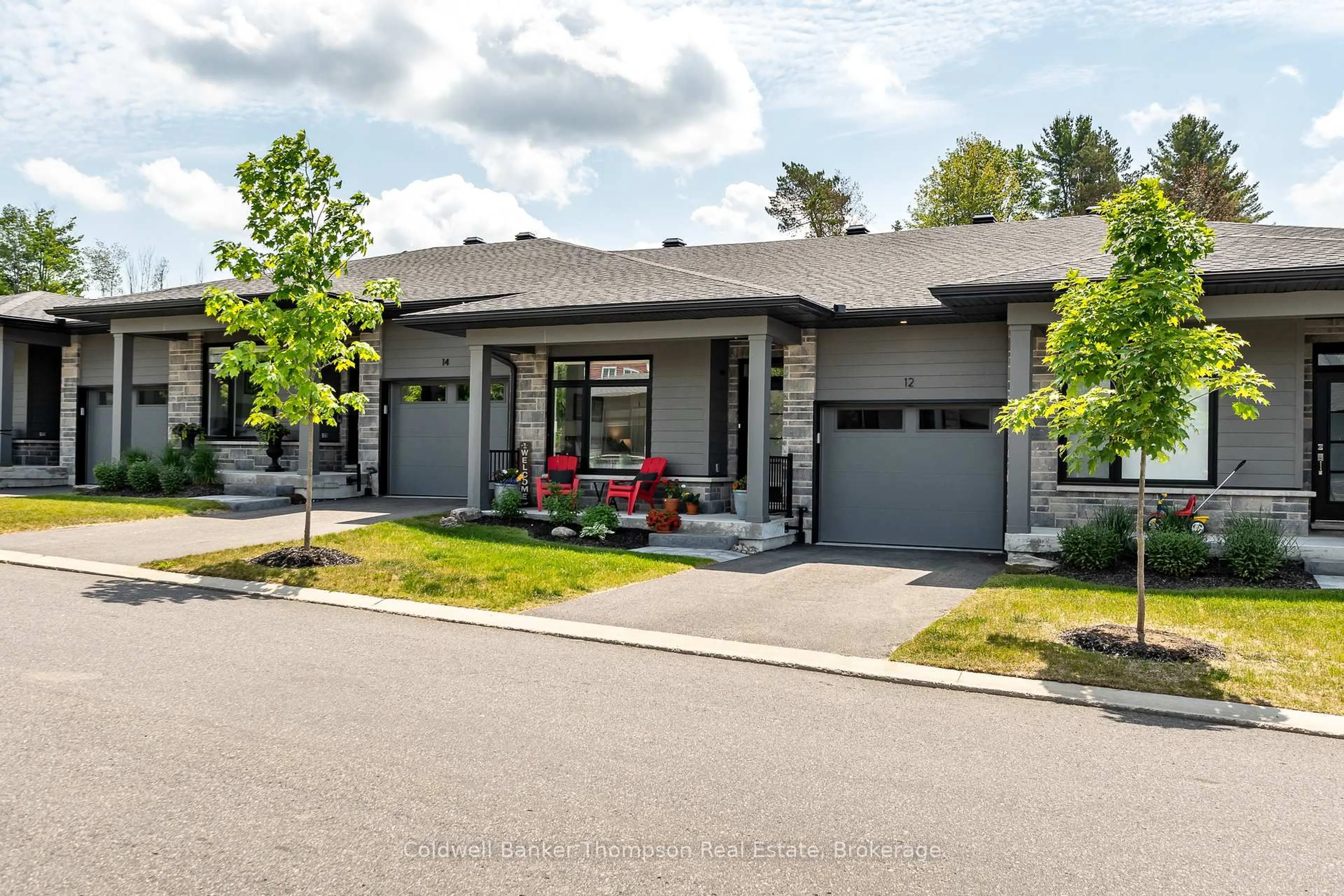 Home with brick exterior material, street for 12 Blue Birch Lane, Huntsville Ontario P1H 0G4