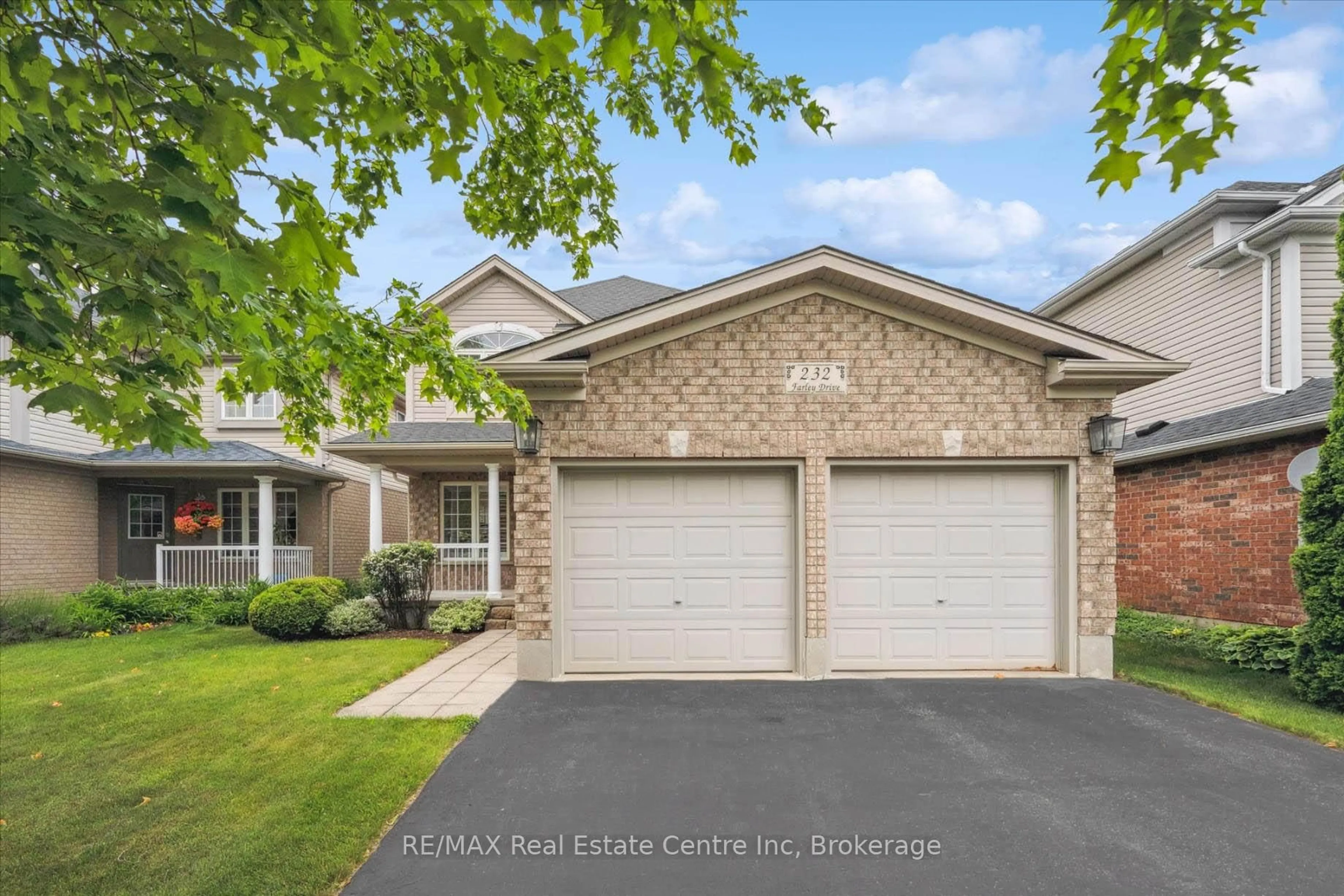 Home with brick exterior material, street for 232 FARLEY Dr, Guelph Ontario N1L 1N2